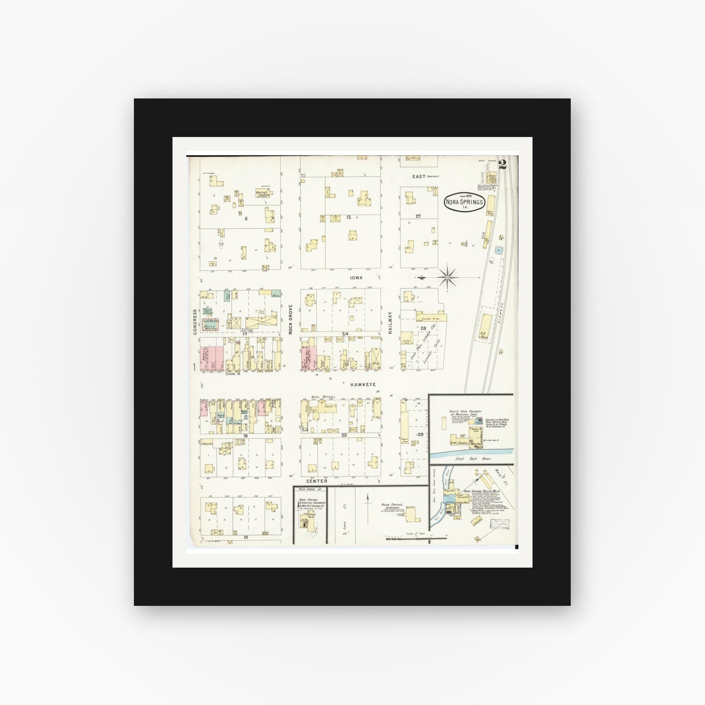 Old map wall art mockup — black gallery frame with white mat — Sanborn Fire Insurance Map from Nora Springs, Floyd County, Iowa (1896), Sheet #0002