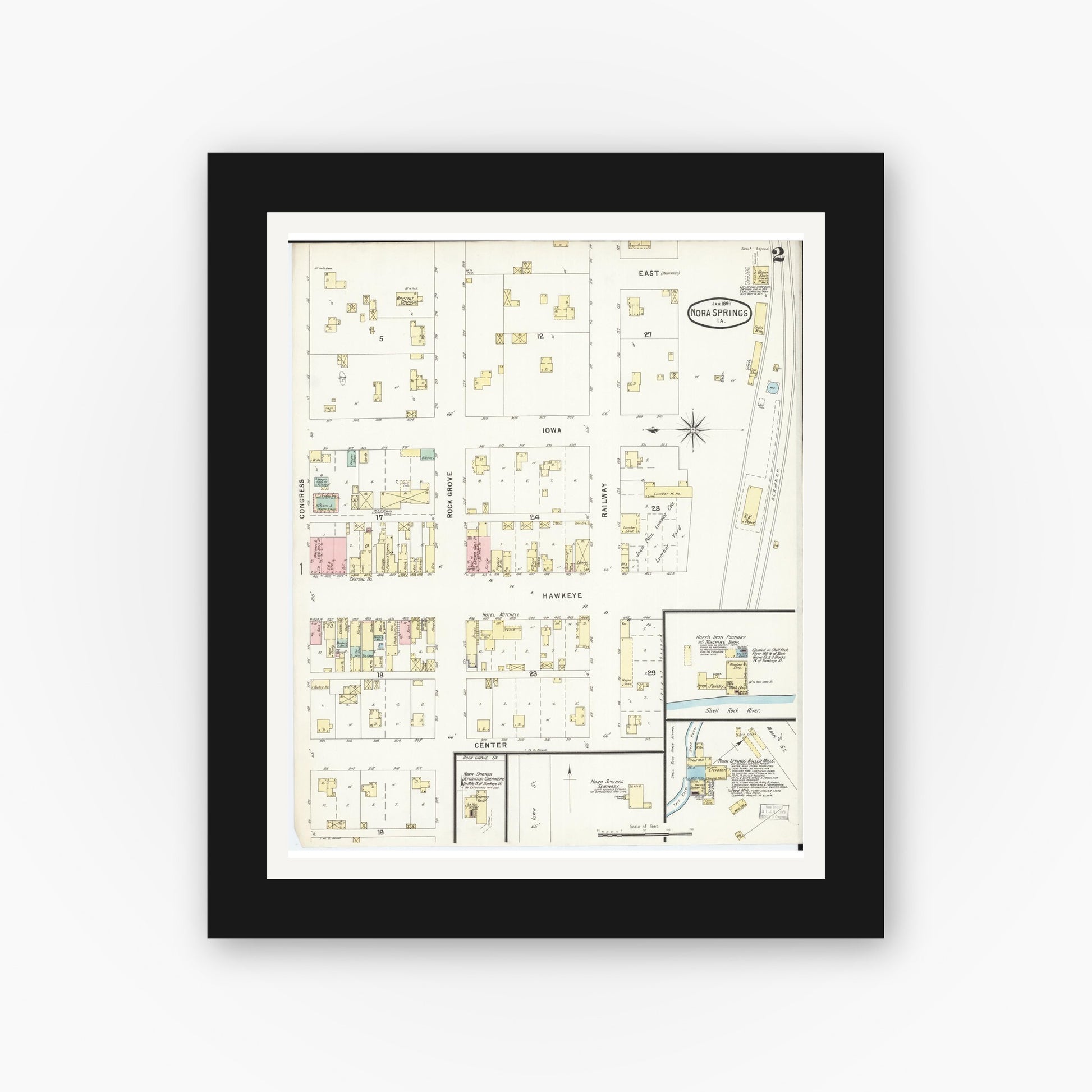 Old map wall art mockup — black gallery frame with white mat — Sanborn Fire Insurance Map from Nora Springs, Floyd County, Iowa (1896), Sheet #0002