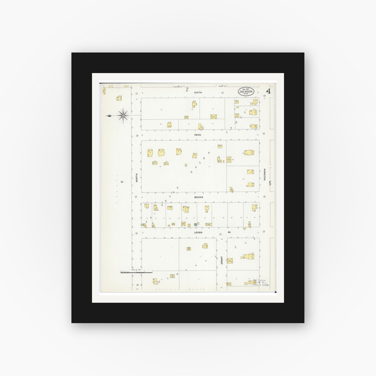 Old map wall art mockup — black gallery frame with white mat — Sanborn Fire Insurance Map from Jackson, Jackson County, Minnesota (1907), Sheet #0004