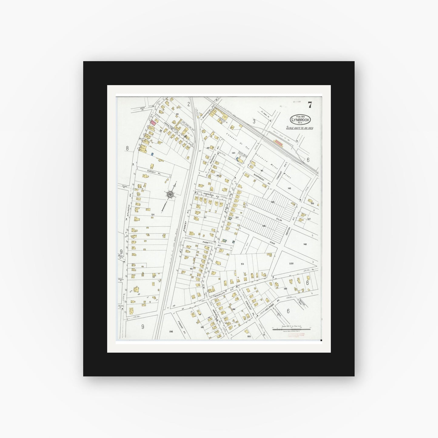 Old map wall art mockup — black gallery frame with white mat — Sanborn Fire Insurance Map from Lynbrook, Nassau County, New York (1919), Sheet #0007