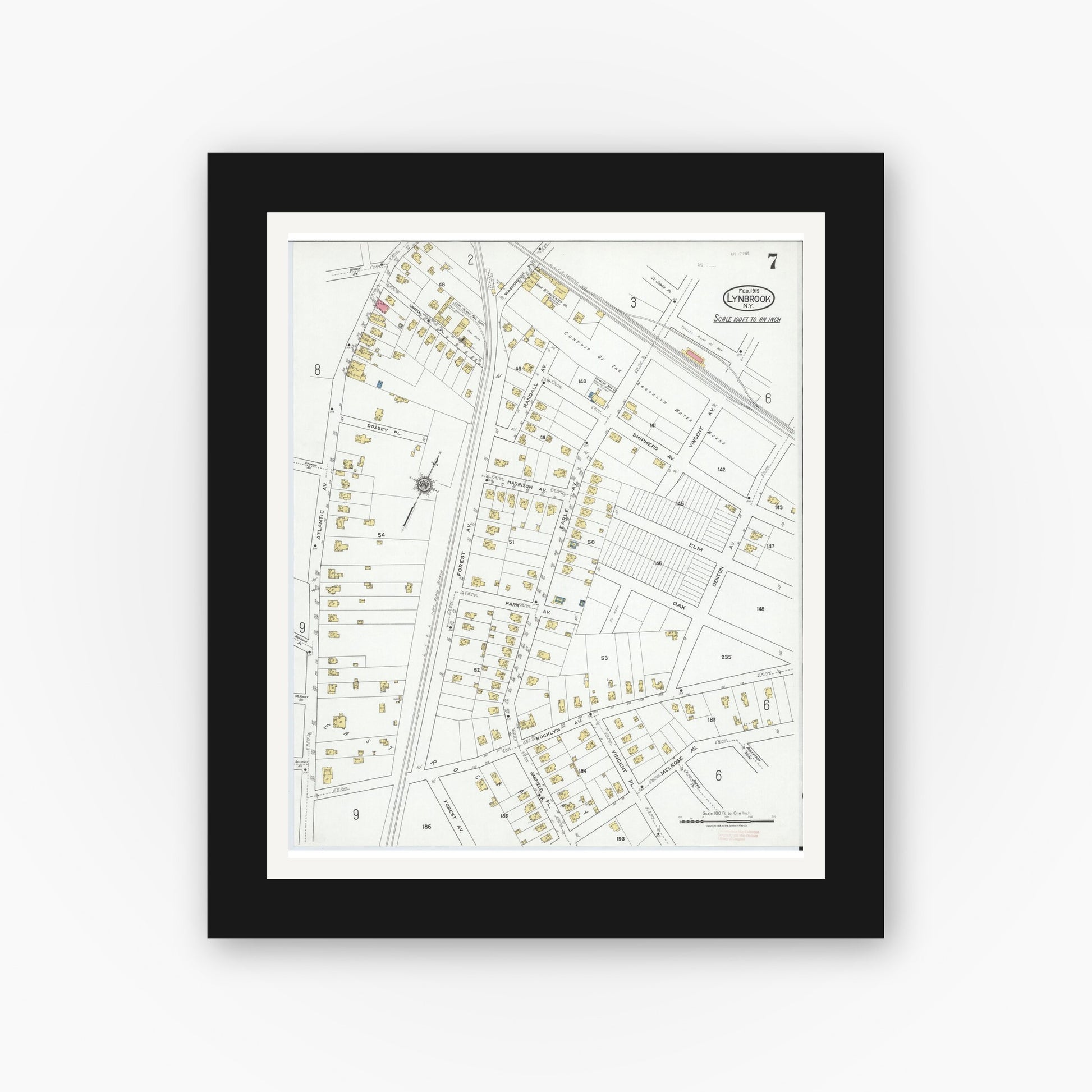 Old map wall art mockup — black gallery frame with white mat — Sanborn Fire Insurance Map from Lynbrook, Nassau County, New York (1919), Sheet #0007