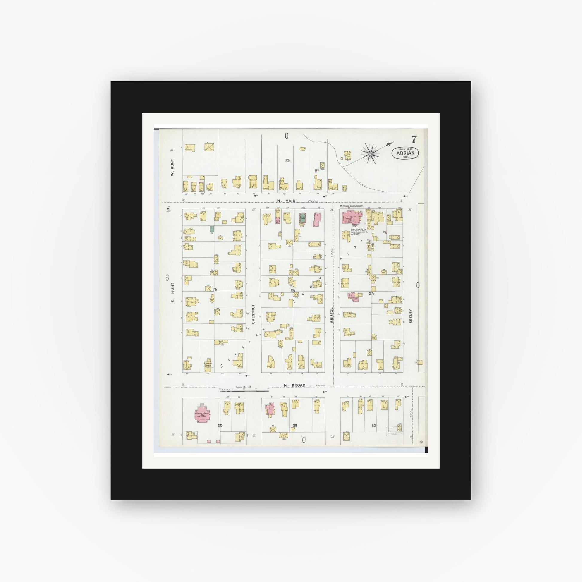 Old map wall art mockup — black gallery frame with white mat — Sanborn Fire Insurance Map from Adrian, Lenawee County, Michigan (1899), Sheet #0007