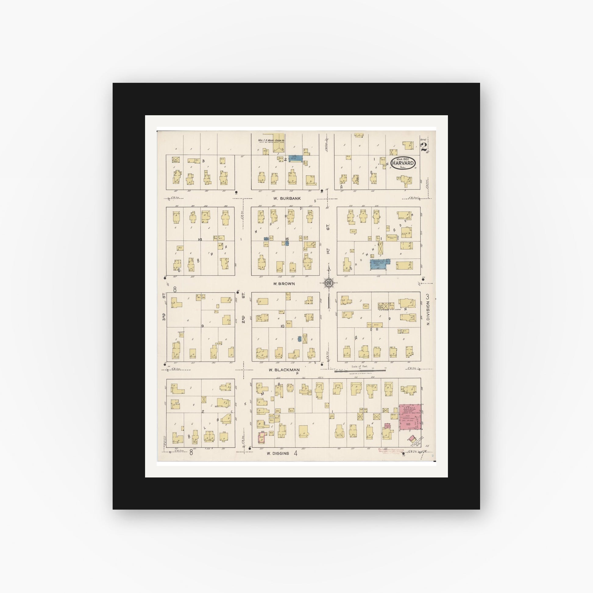 Old map wall art mockup — black gallery frame with white mat — Sanborn Fire Insurance Map from Harvard, McHenry County, Illinois (1922), Sheet #0002