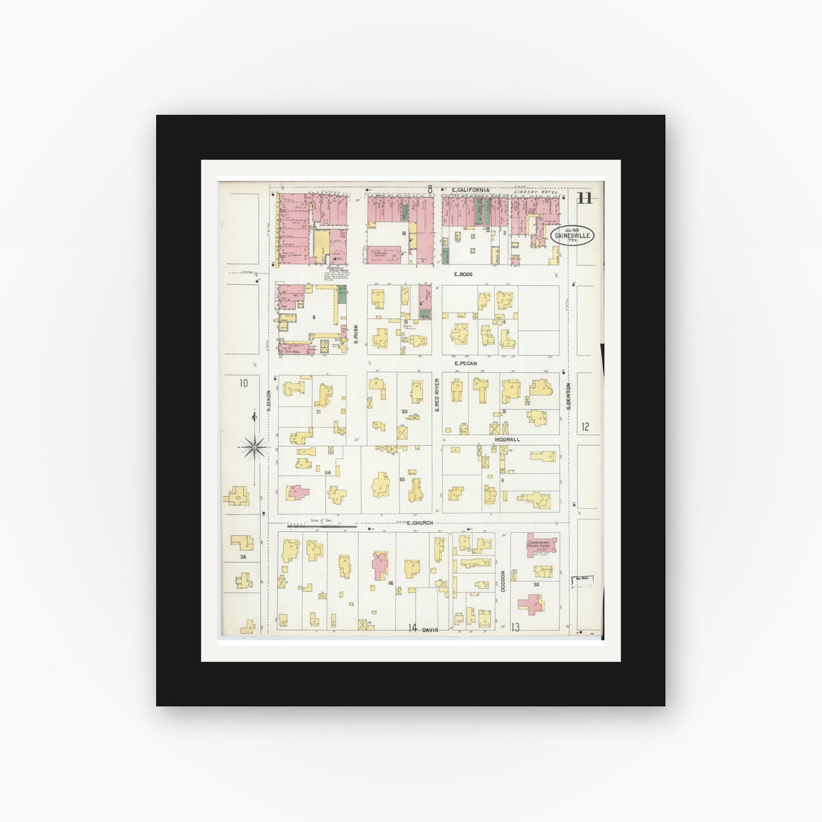 Old map wall art mockup — black gallery frame with white mat — Sanborn Fire Insurance Map from Gainesville, Cooke County, Texas (1902), Sheet #0011