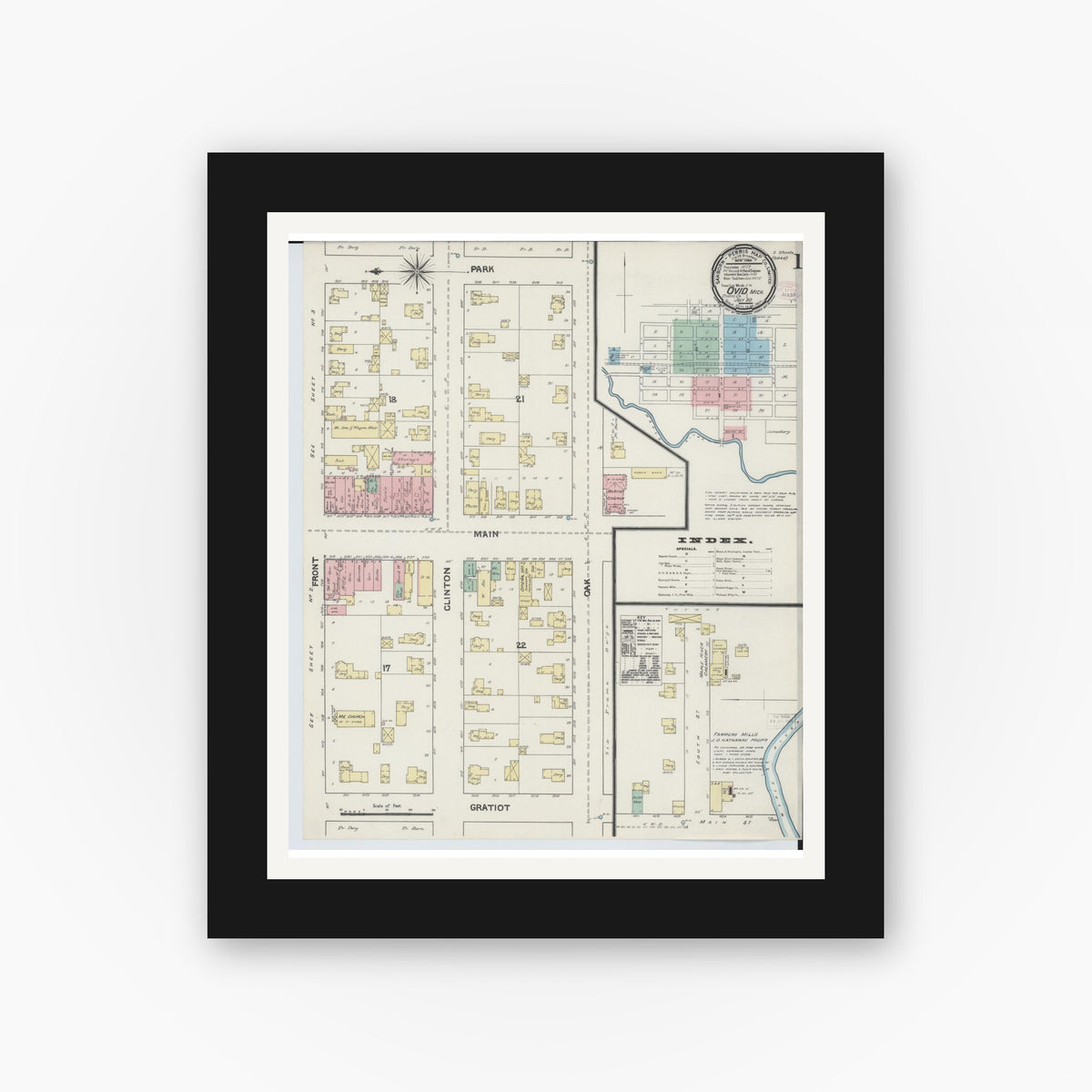 Old map wall art mockup — black gallery frame with white mat — Sanborn Fire Insurance Map from Ovid, Clinton County, Michigan (1890), Sheet #0001