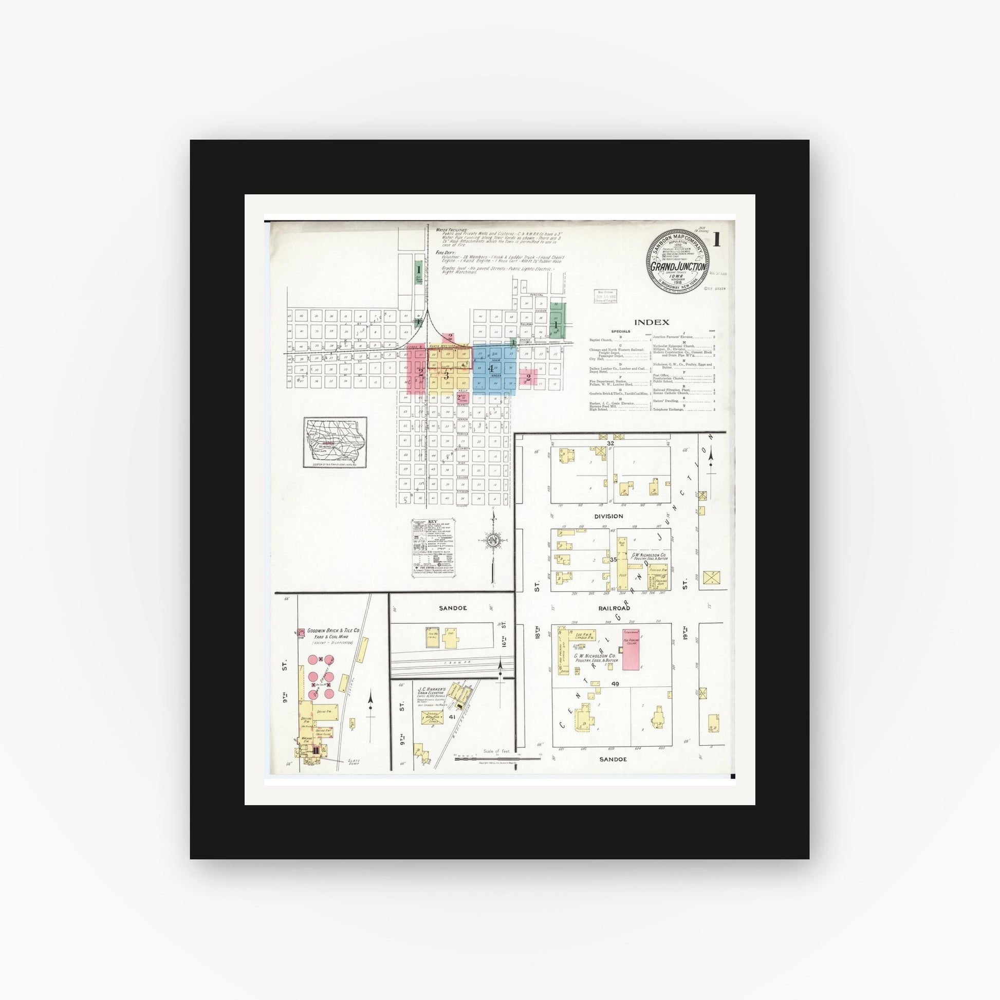 Old map wall art mockup — black gallery frame with white mat — Sanborn Fire Insurance Map from Grand Junction, Greene County, Iowa (1918) â€” Complete Set