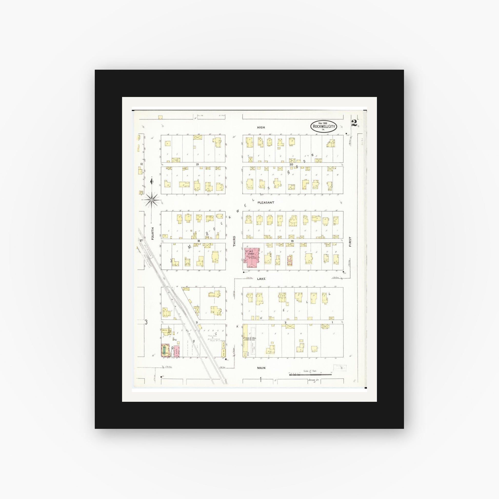 Old map wall art mockup — black gallery frame with white mat — Sanborn Fire Insurance Map from Rockwell City, Calhoun County, Iowa (1909), Sheet #0002