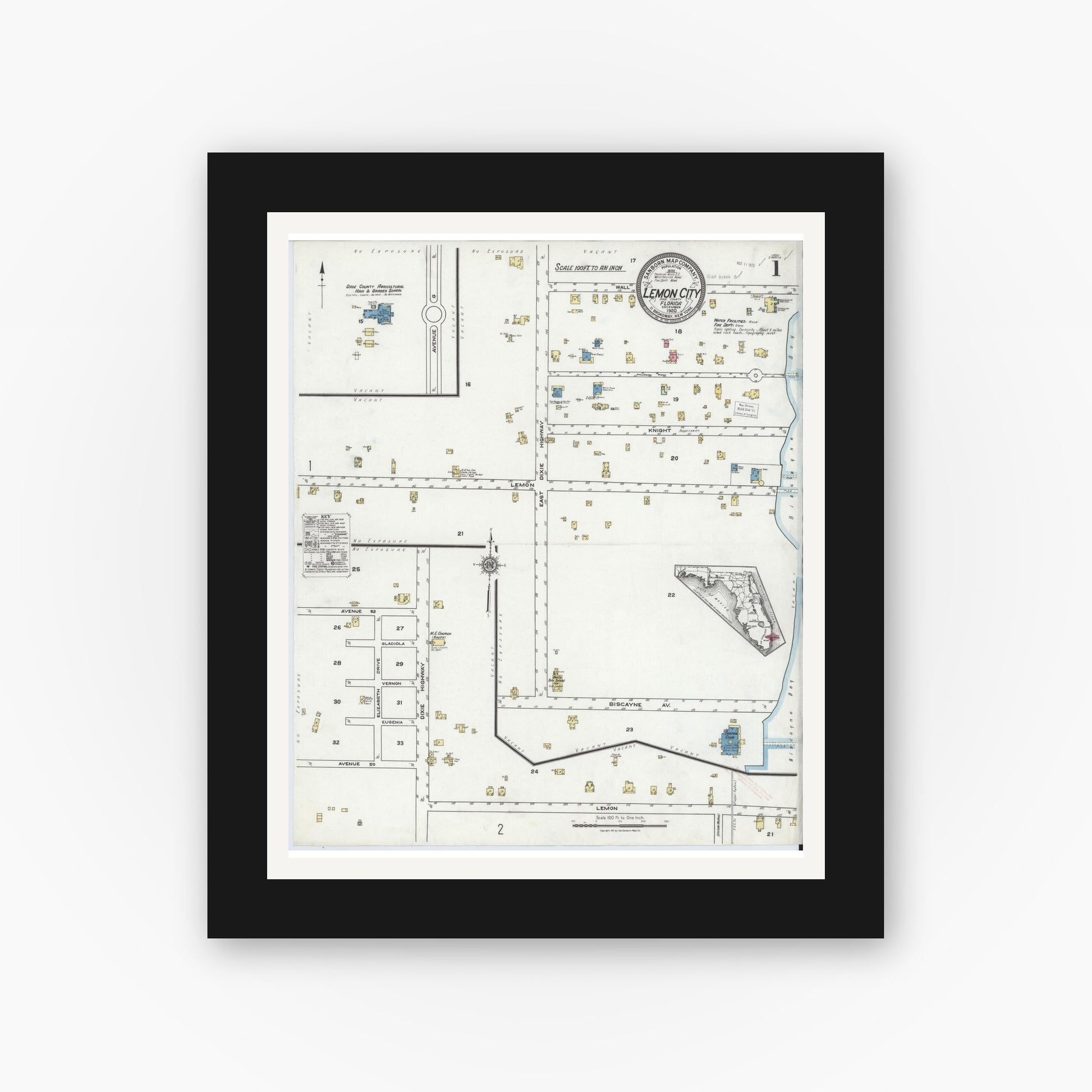 Old map wall art mockup — black gallery frame with white mat — Sanborn Fire Insurance Map from Lemon City, Dade County, Florida (1920) - Complete Map Set
