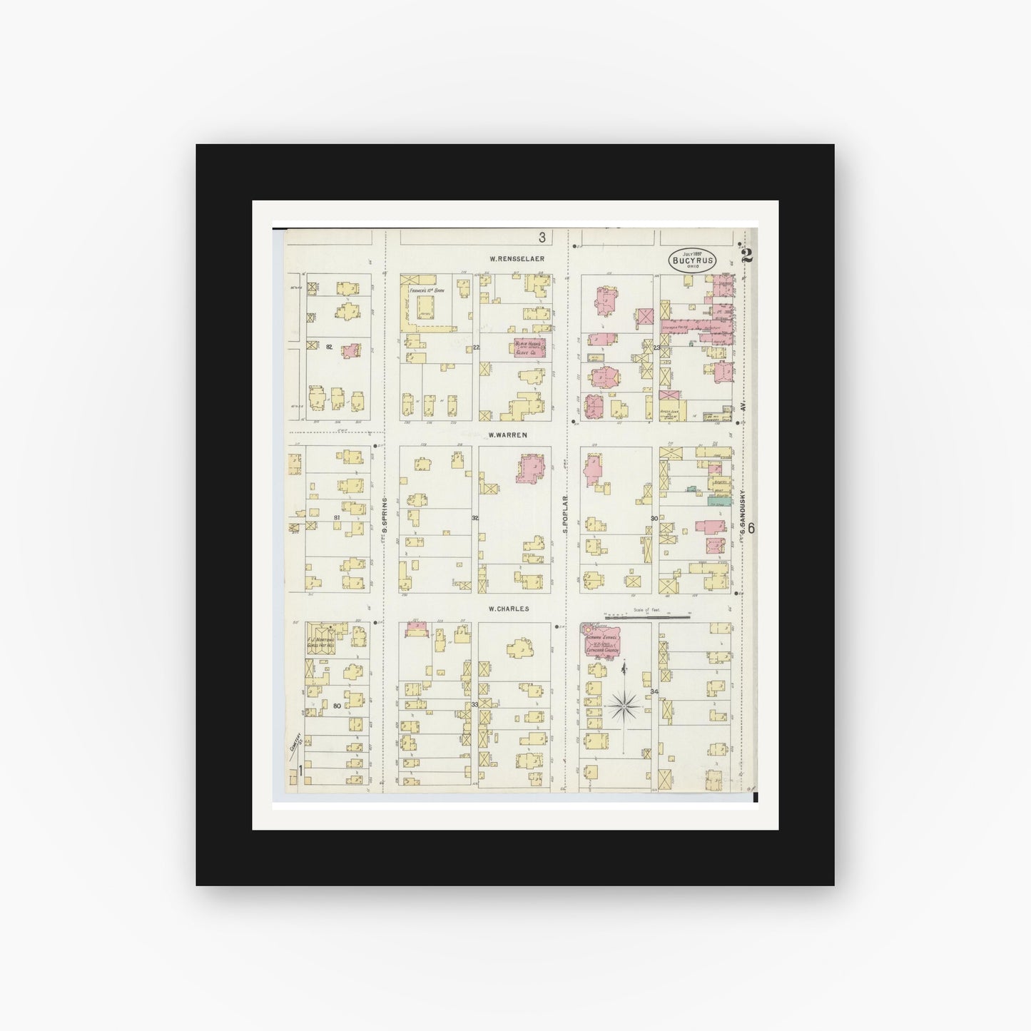 Old map wall art mockup — black gallery frame with white mat — Sanborn Fire Insurance Map from Bucyrus, Crawford County, Ohio (1897), Sheet #0002
