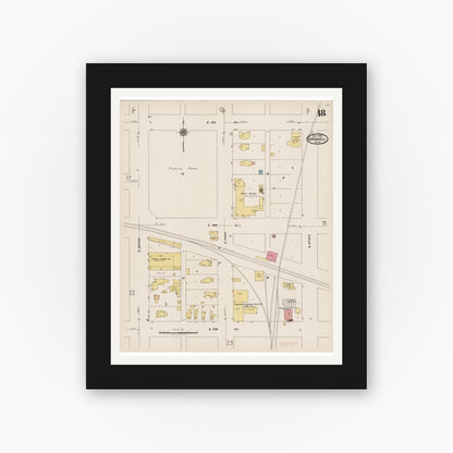 Old map wall art mockup — black gallery frame with white mat — Sanborn Fire Insurance Map from Grinnell, Poweshiek County, Iowa (1922), Sheet #0018
