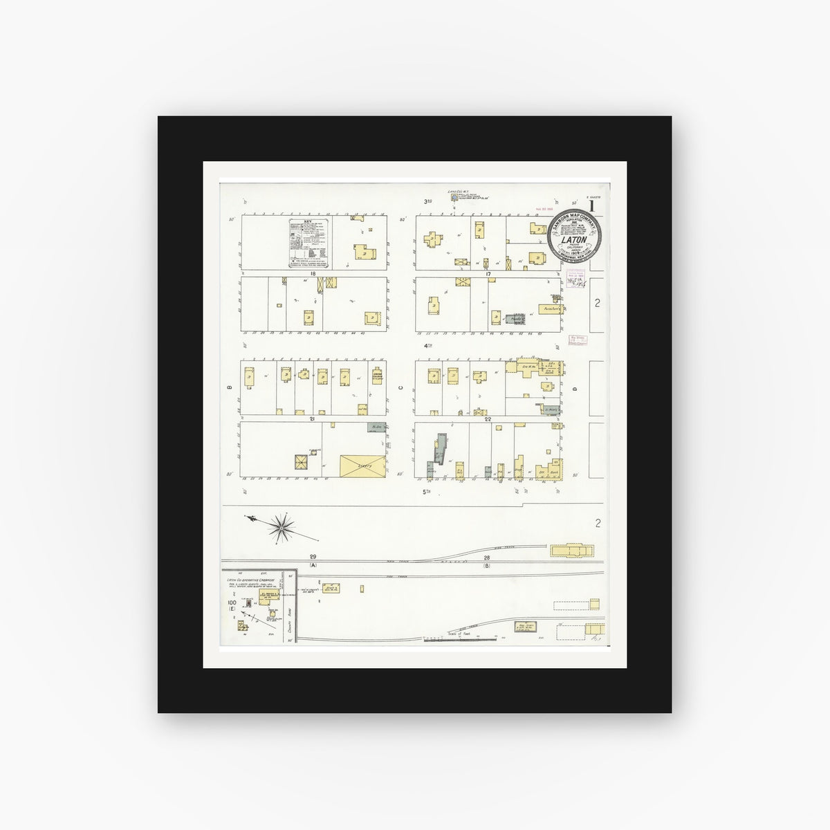 Old map wall art mockup — black gallery frame with white mat — Sanborn Fire Insurance Map from Laton, Fresno County, California (1909), Sheet #0001