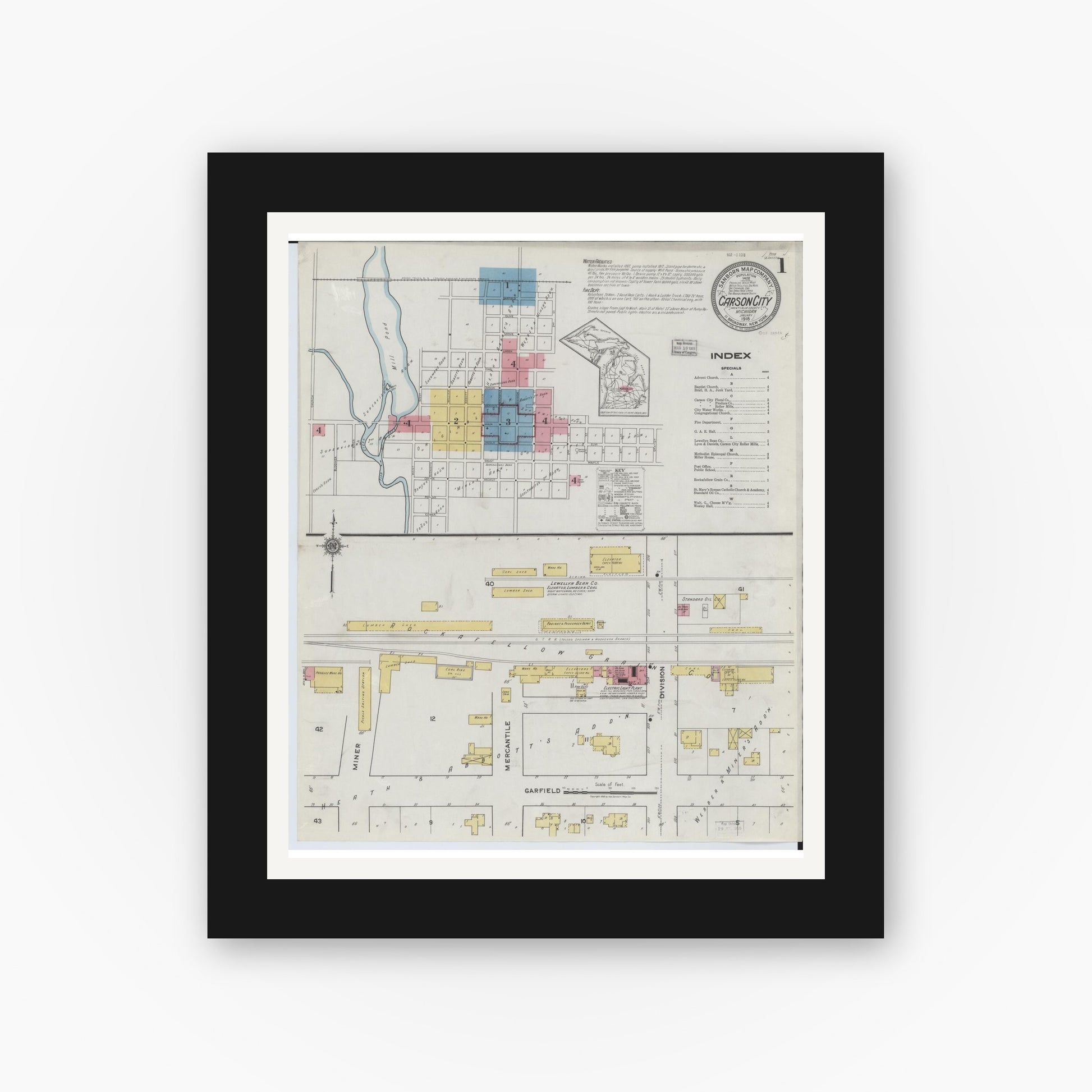Old map wall art mockup — black gallery frame with white mat — Sanborn Fire Insurance Map from Carson City, Montcalm County, Michigan (1918), Sheet #0001