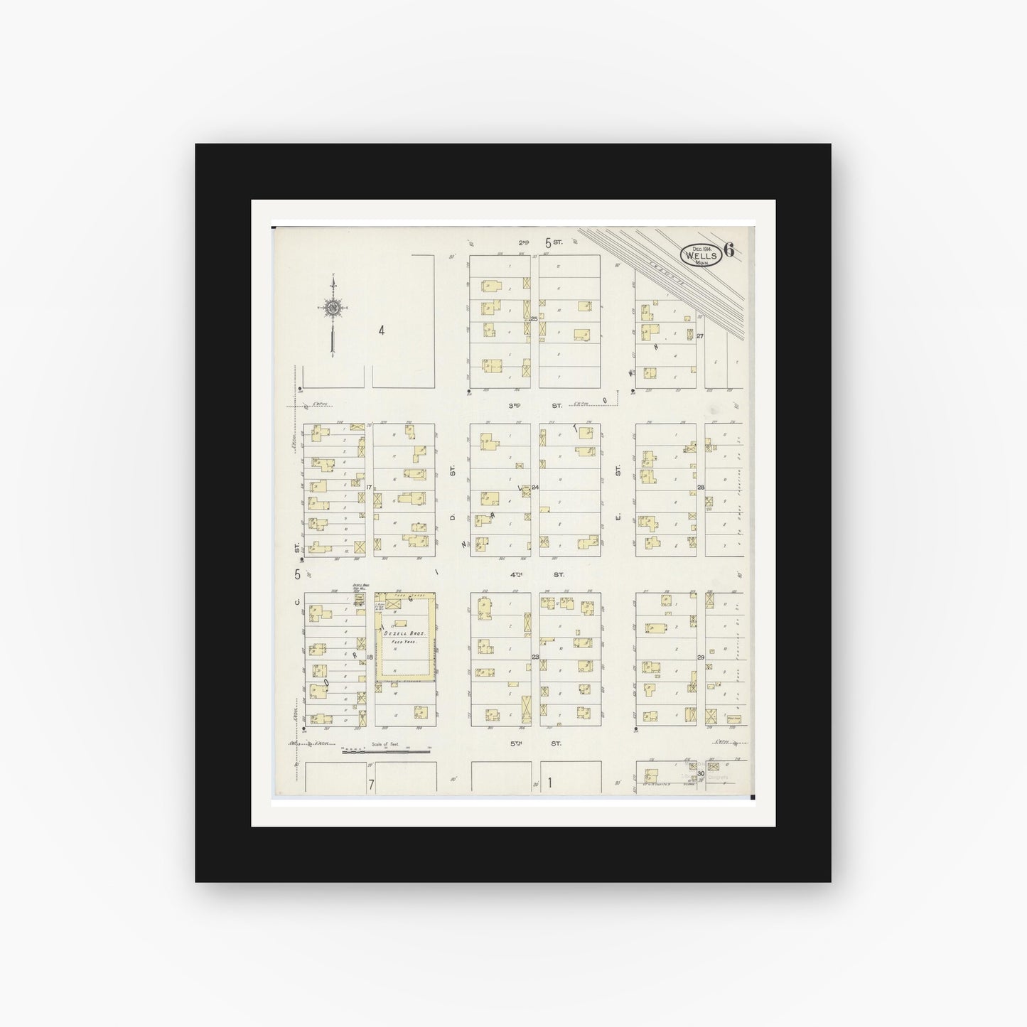 Old map wall art mockup — black gallery frame with white mat — Sanborn Fire Insurance Map from Wells, Faribault County, Minnesota (1914), Sheet #0006