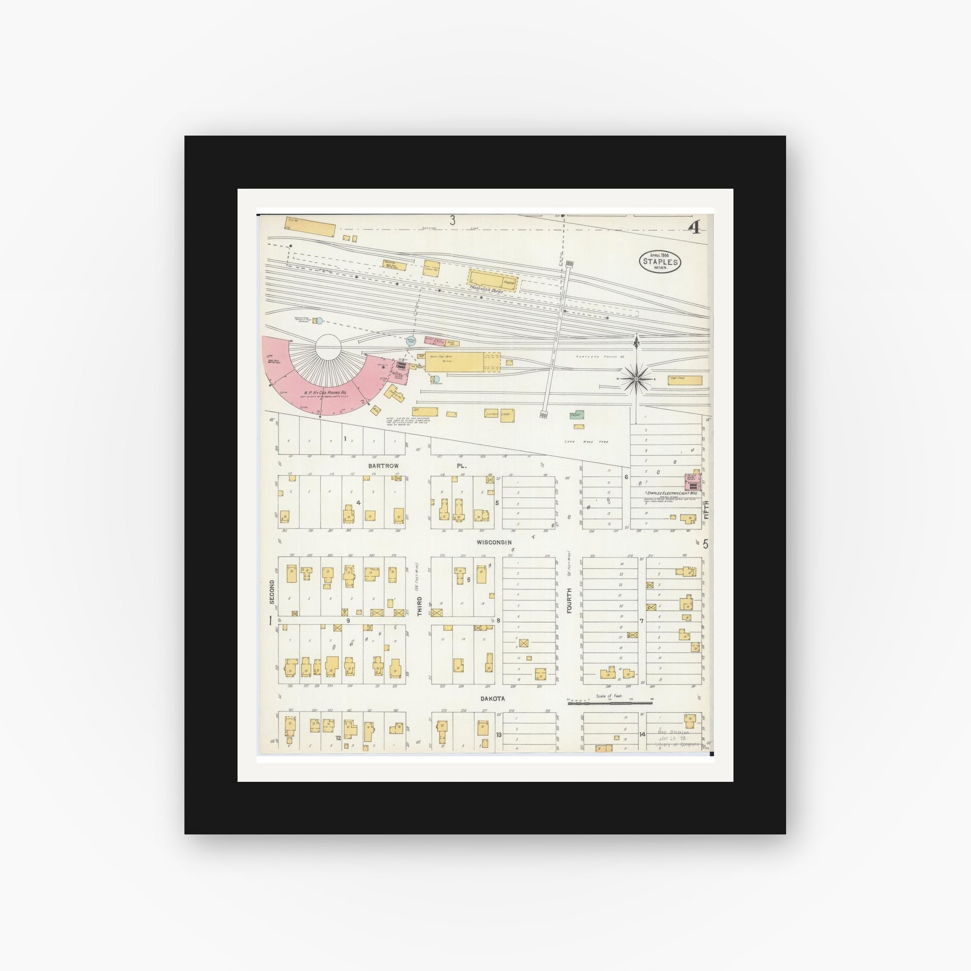 Old map wall art mockup — black gallery frame with white mat — Sanborn Fire Insurance Map from Staples, Todd County, Minnesota (1904), Sheet #0004