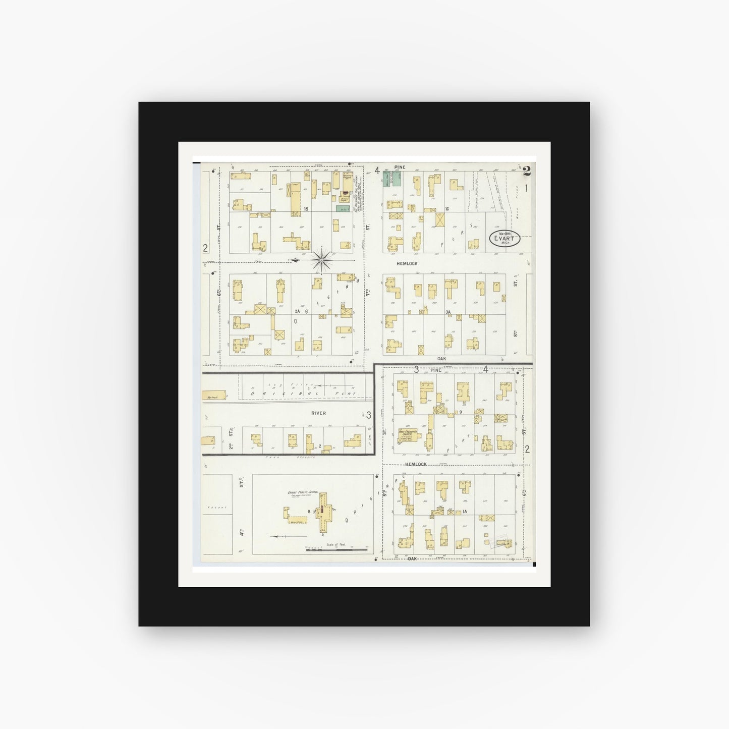 Old map wall art mockup — black gallery frame with white mat — Sanborn Fire Insurance Map from Evart, Osceola County, Michigan (1899), Sheet #0002
