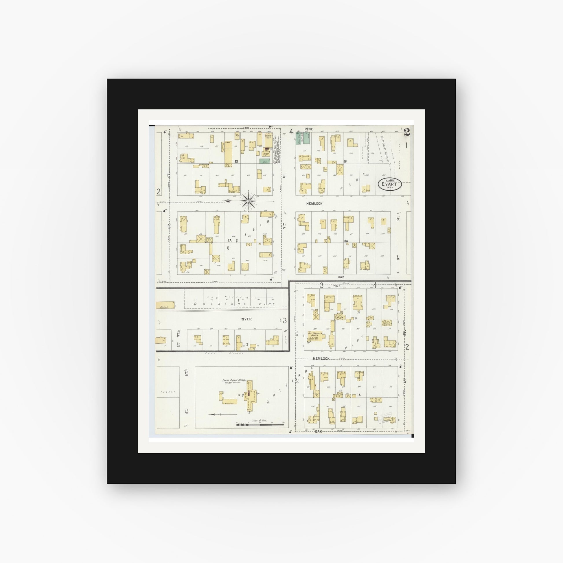 Old map wall art mockup — black gallery frame with white mat — Sanborn Fire Insurance Map from Evart, Osceola County, Michigan (1899), Sheet #0002