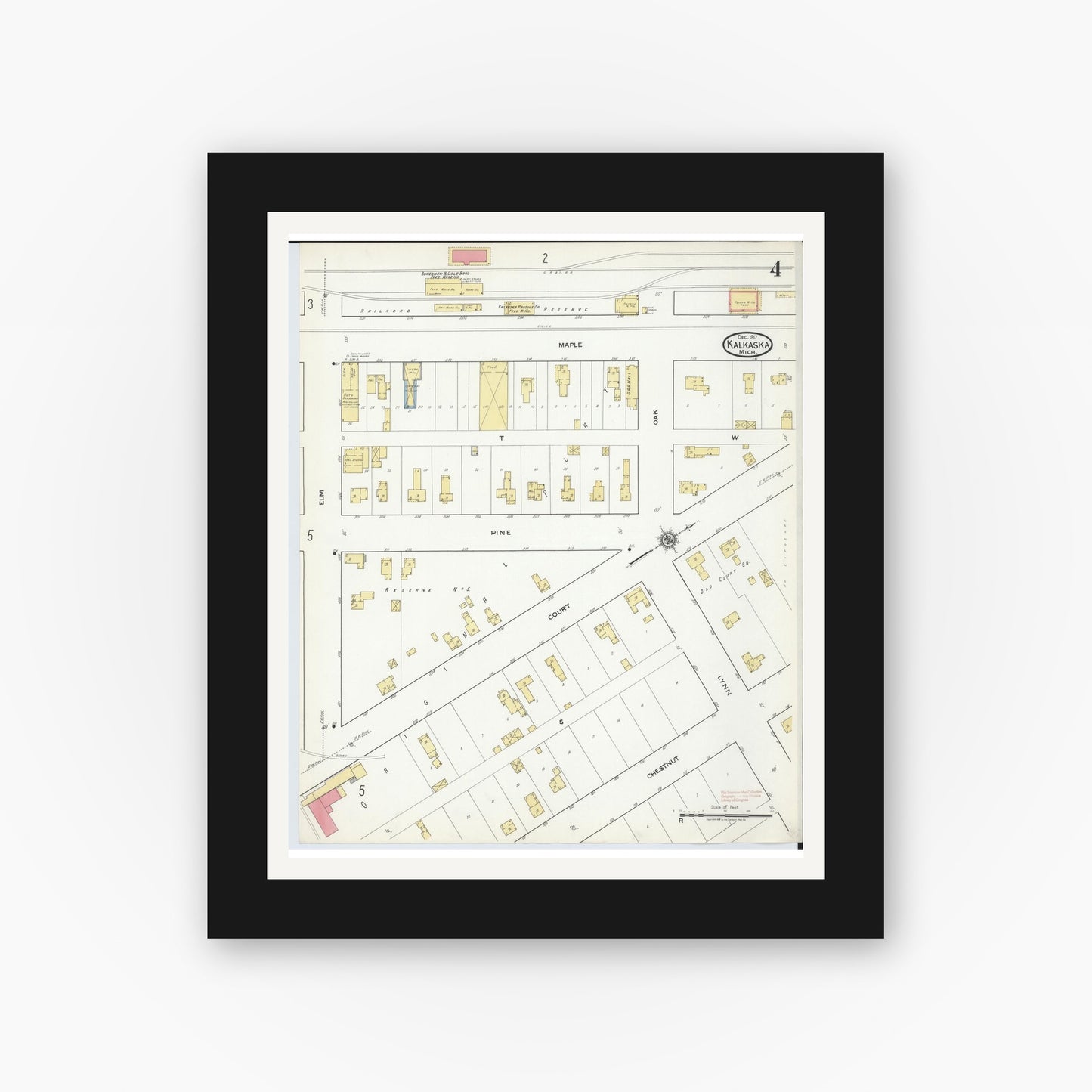 Old map wall art mockup — black gallery frame with white mat — Sanborn Fire Insurance Map from Kalkaska, Kalkaska County, Michigan (1917), Sheet #0004