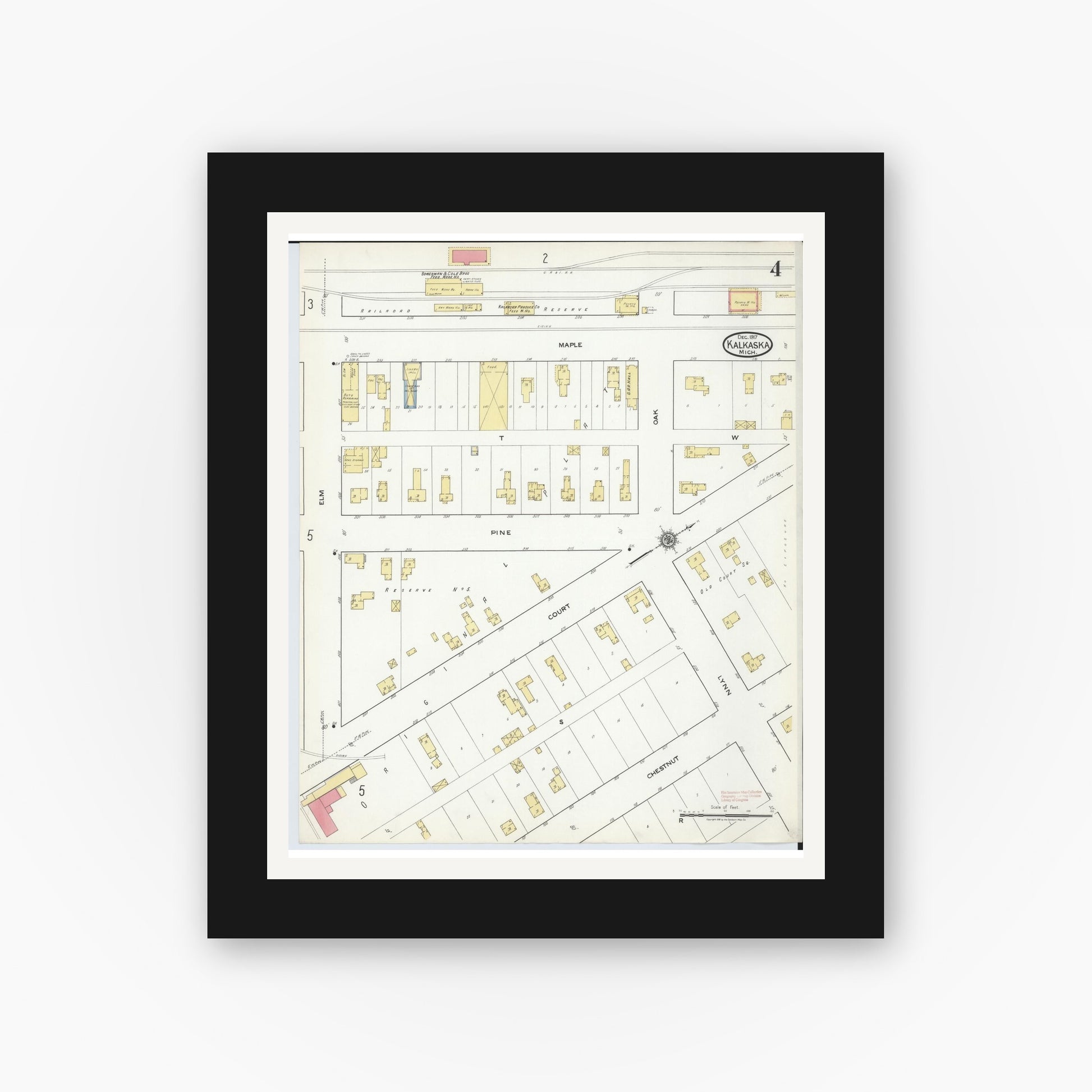 Old map wall art mockup — black gallery frame with white mat — Sanborn Fire Insurance Map from Kalkaska, Kalkaska County, Michigan (1917), Sheet #0004