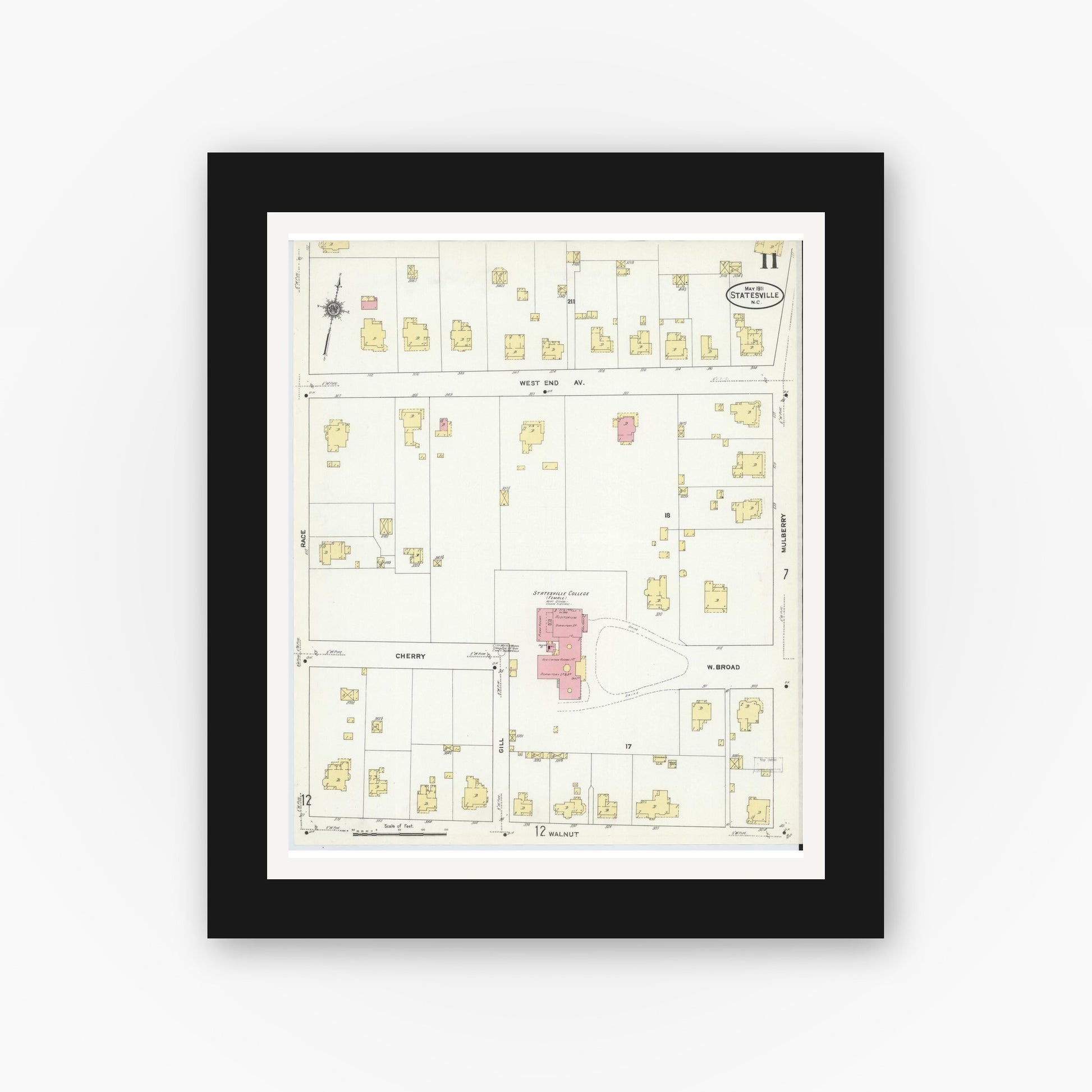 Old map wall art mockup — black gallery frame with white mat — Sanborn Fire Insurance Map from Statesville, Iredell County, North Carolina (1911), Sheet #0011