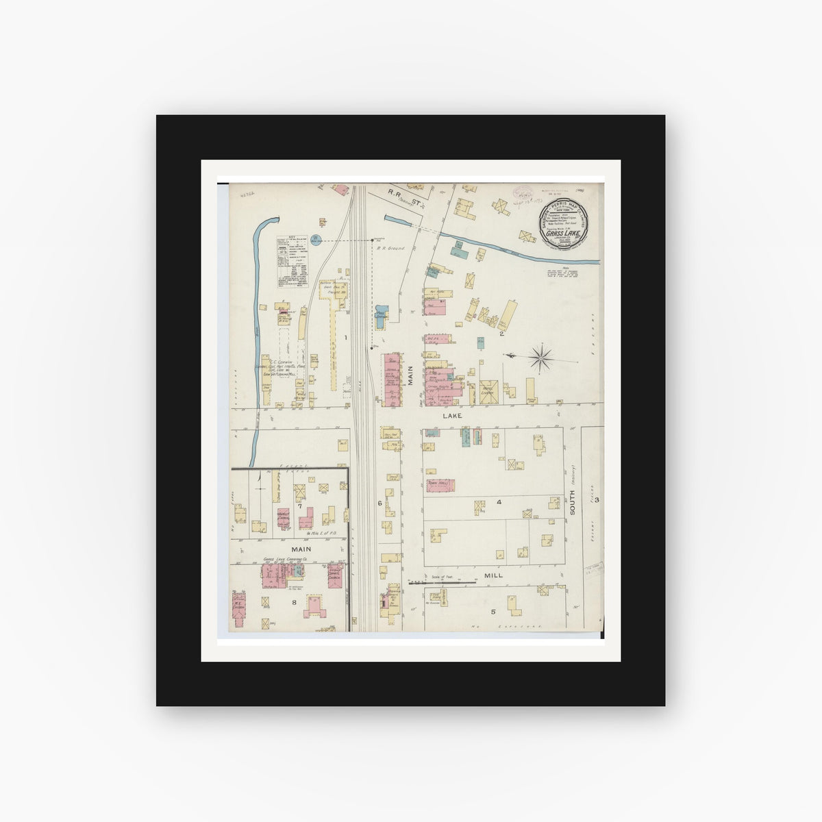 Old map wall art mockup — black gallery frame with white mat — Sanborn Fire Insurance Map from Grass Lake, Jackson County, Michigan (1893), Sheet #0001