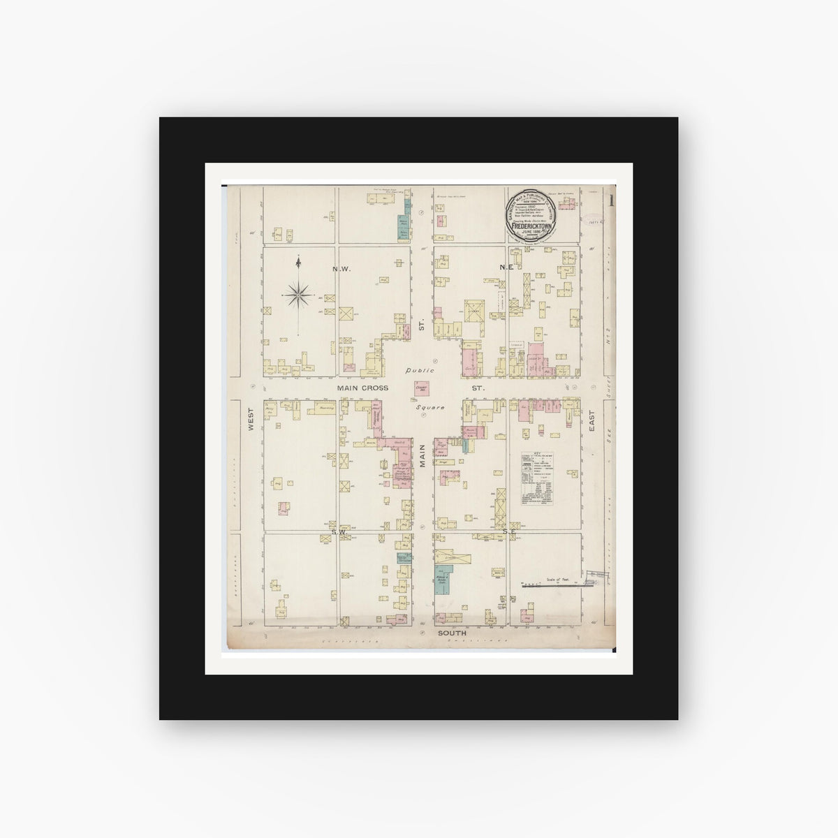 Old map wall art mockup — black gallery frame with white mat — Sanborn Fire Insurance Map from Fredericktown, Madison County, Missouri (1886), Sheet #0001