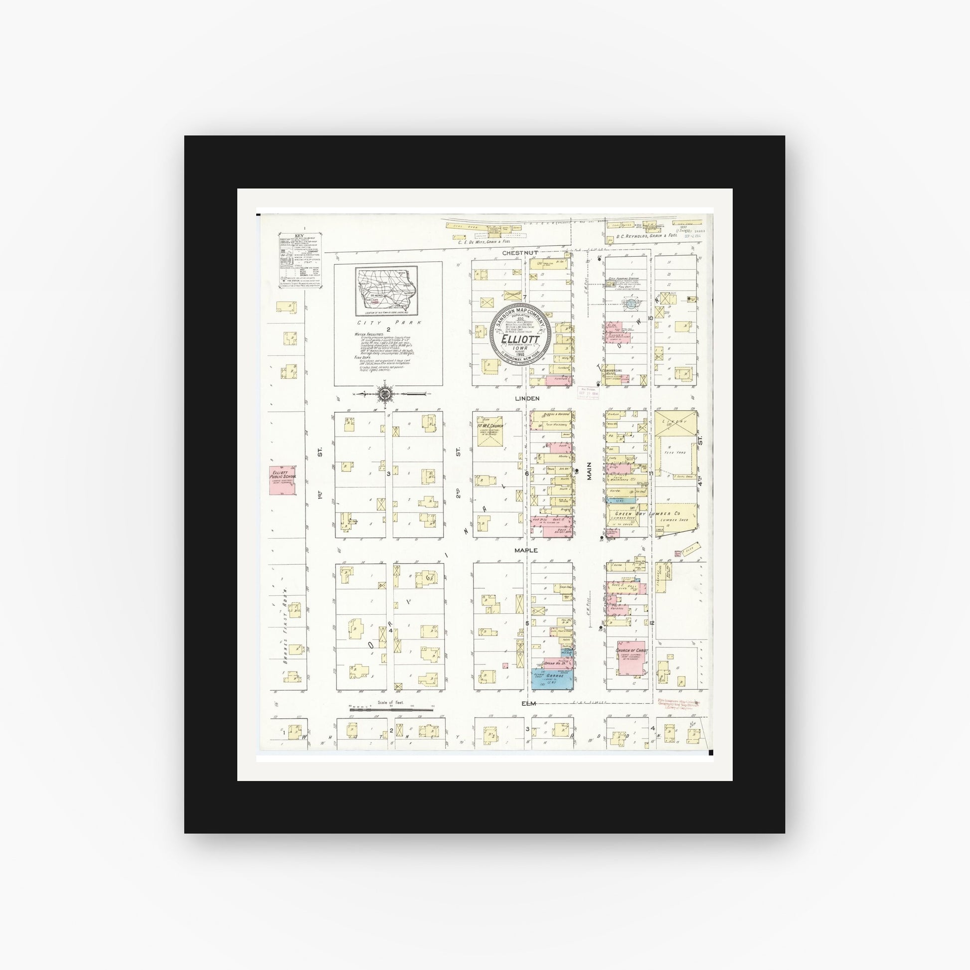 Old map wall art mockup — black gallery frame with white mat — Sanborn Fire Insurance Map from Elliott, Montgomery County, Iowa (1914), Sheet #0001