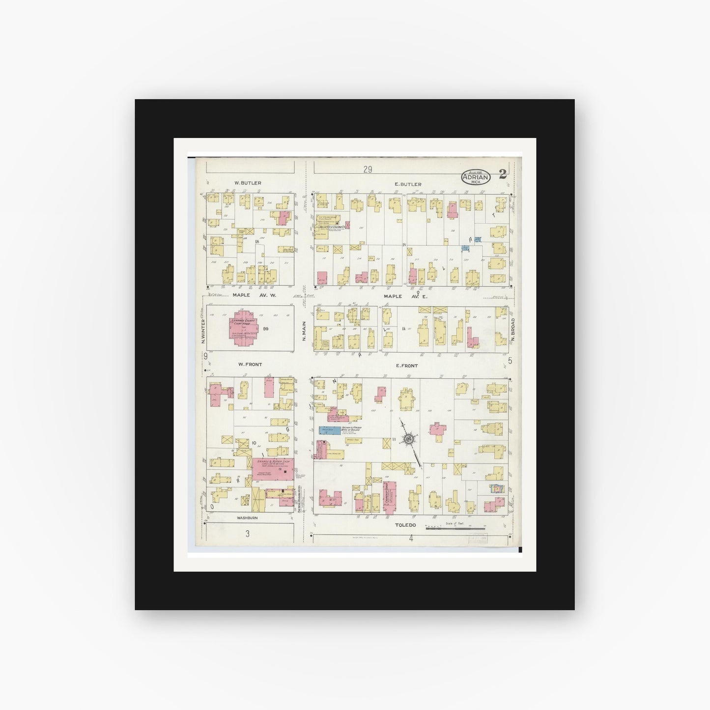 Old map wall art mockup — black gallery frame with white mat — Sanborn Fire Insurance Map from Adrian, Lenawee County, Michigan (1916), Sheet #0002