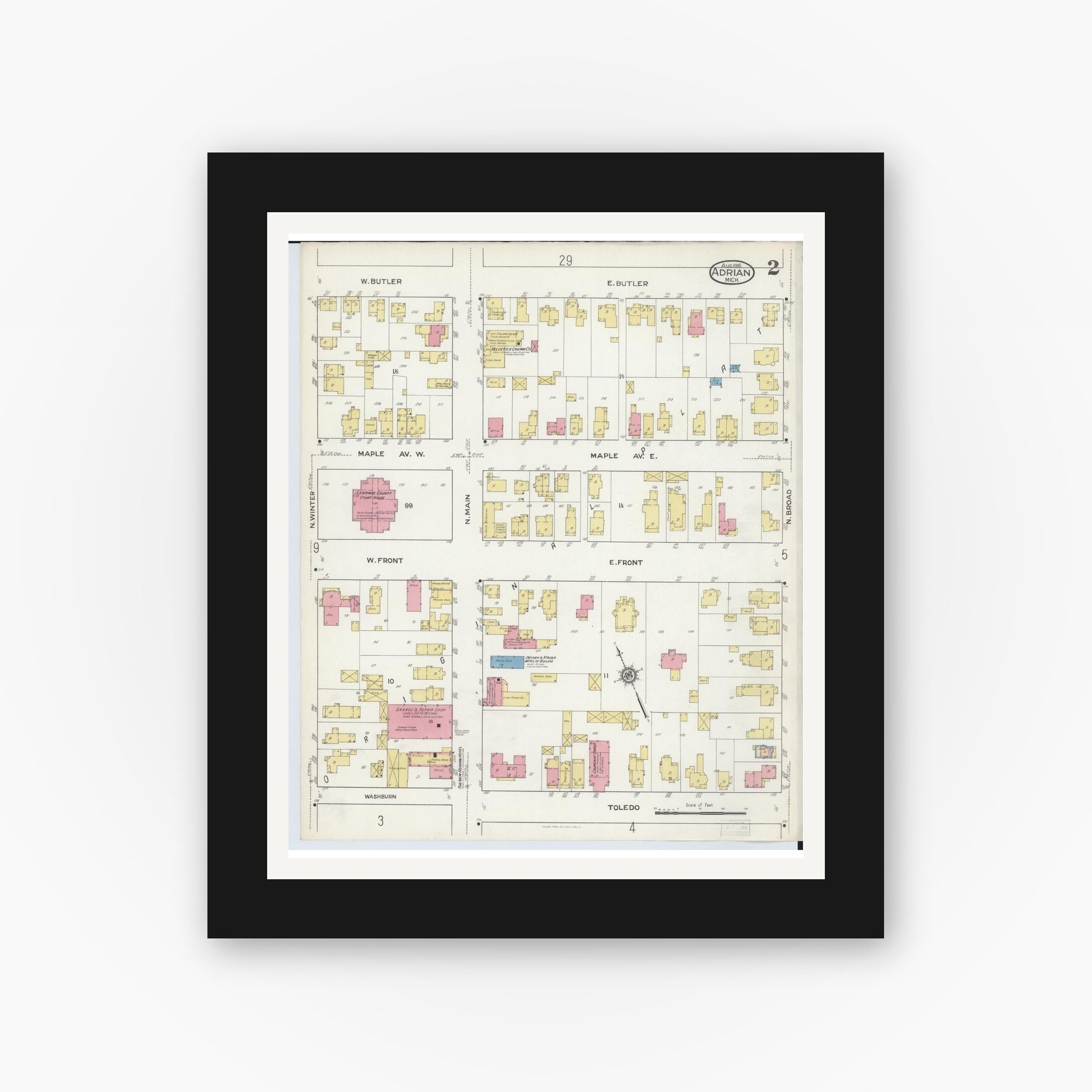 Old map wall art mockup — black gallery frame with white mat — Sanborn Fire Insurance Map from Adrian, Lenawee County, Michigan (1916), Sheet #0002