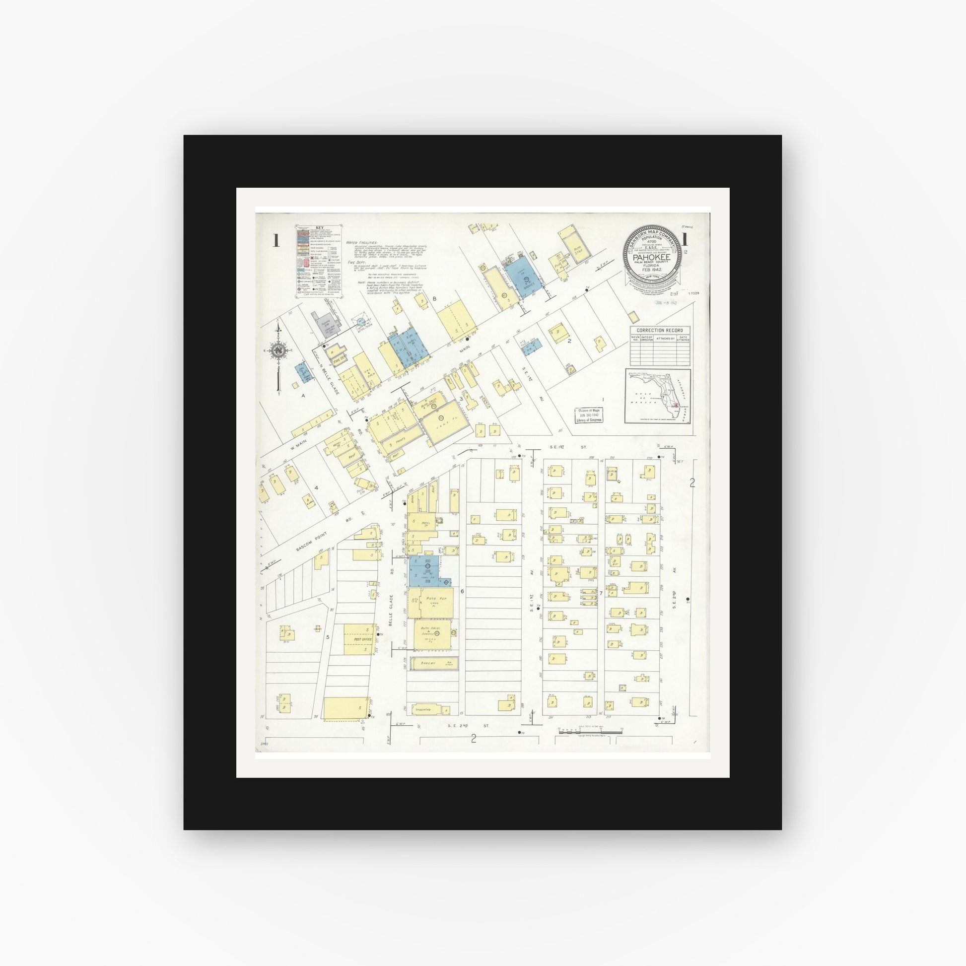 Old map wall art mockup — black gallery frame with white mat — Sanborn Fire Insurance Map from Pahokee, Palm Beach County, Florida (1942), Sheet #0001
