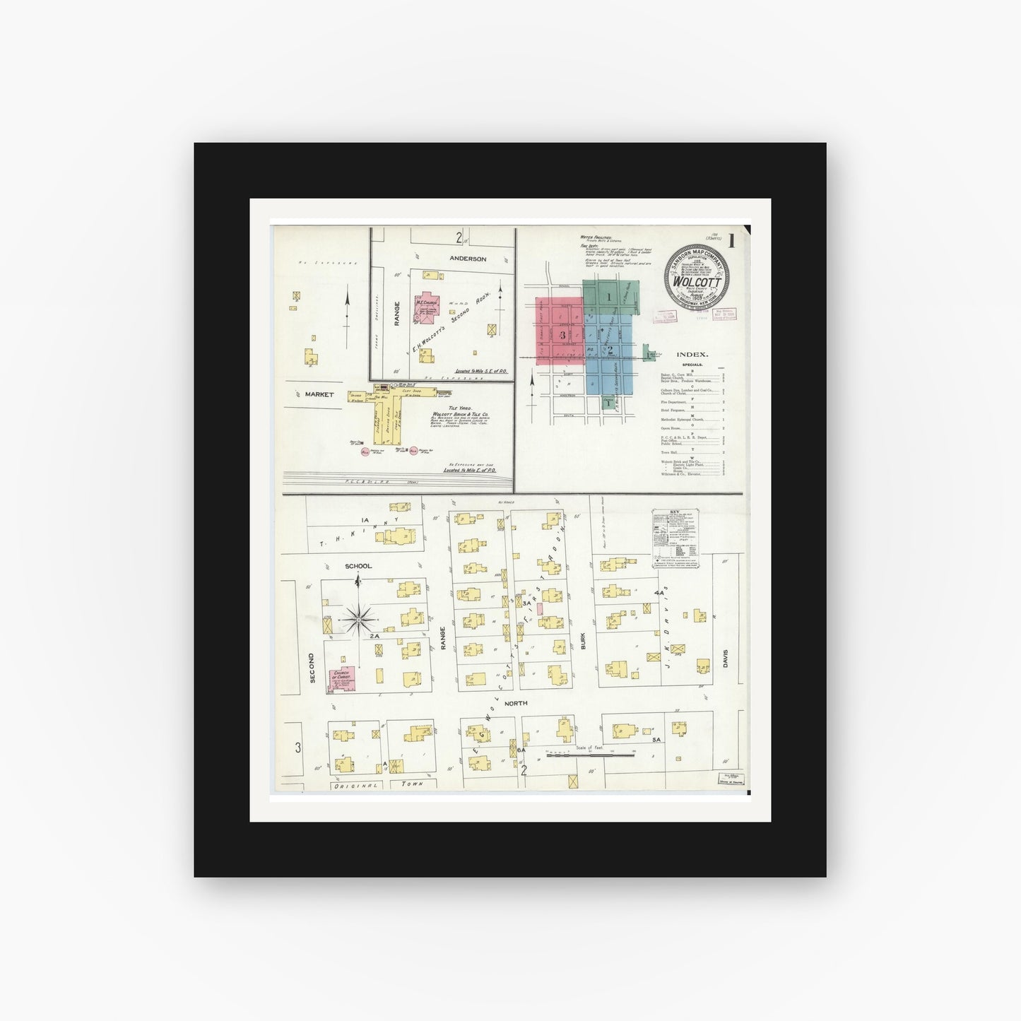Old map wall art mockup — black gallery frame with white mat — Sanborn Fire Insurance Map from Wolcott, White County, Indiana (1909) - Complete Map Set