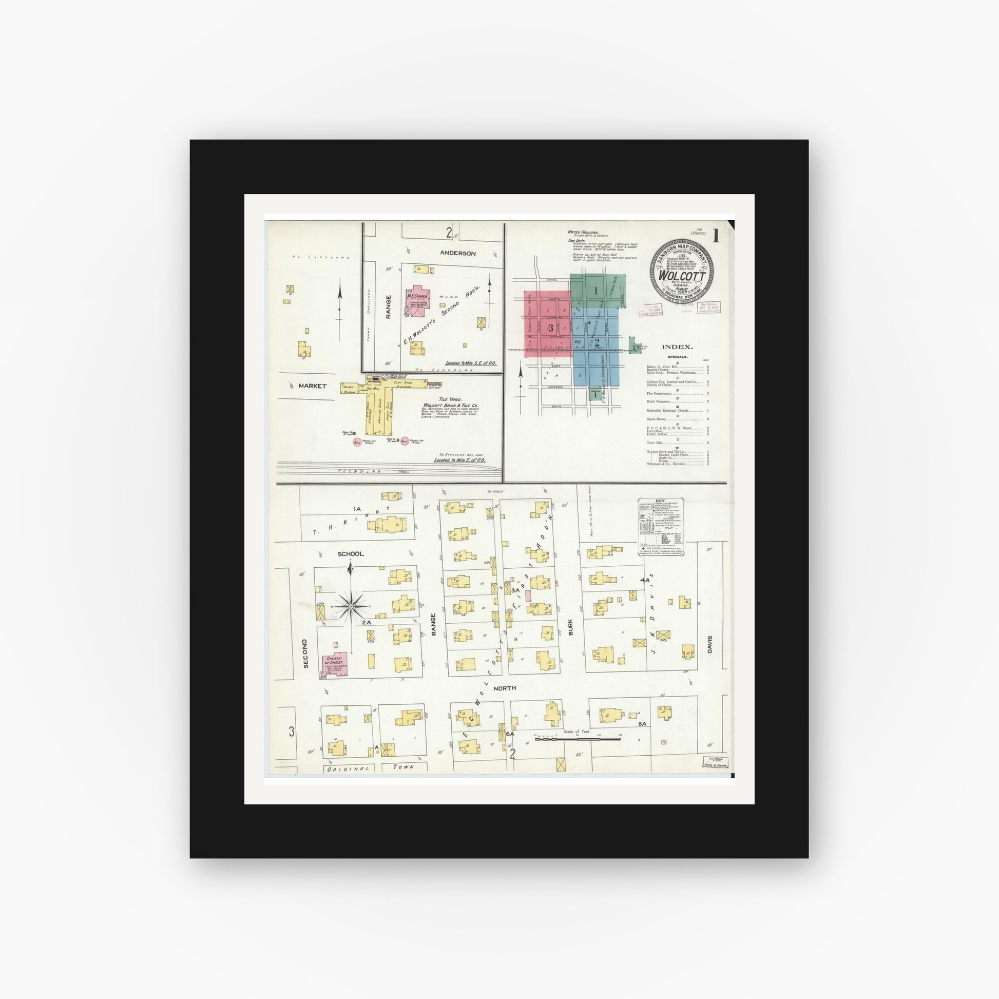 Old map wall art mockup — black gallery frame with white mat — Sanborn Fire Insurance Map from Wolcott, White County, Indiana (1909) - Complete Map Set