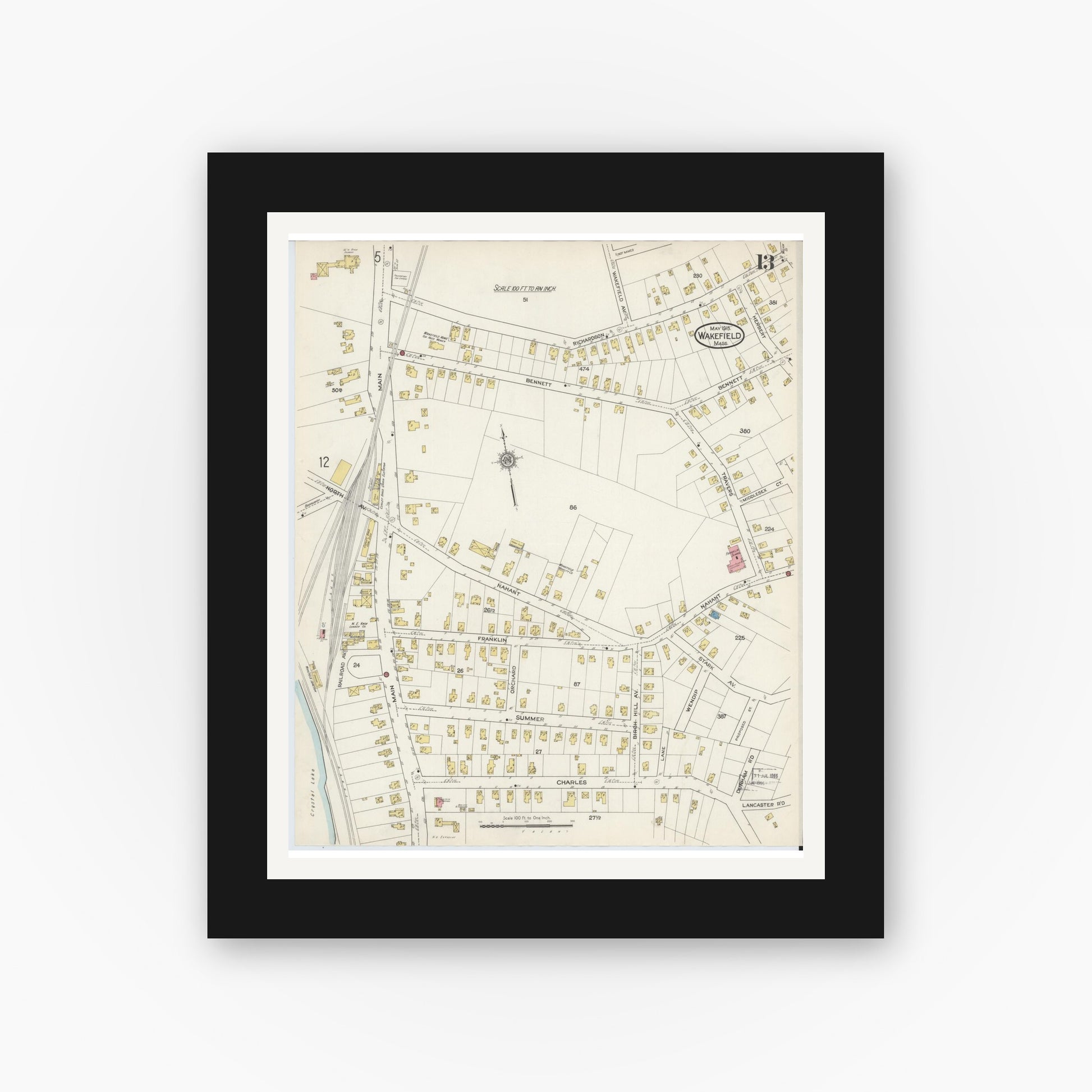 Old map wall art mockup — black gallery frame with white mat — Sanborn Fire Insurance Map from Wakefield, Middlesex County, Massachusetts (1915), Sheet #0013