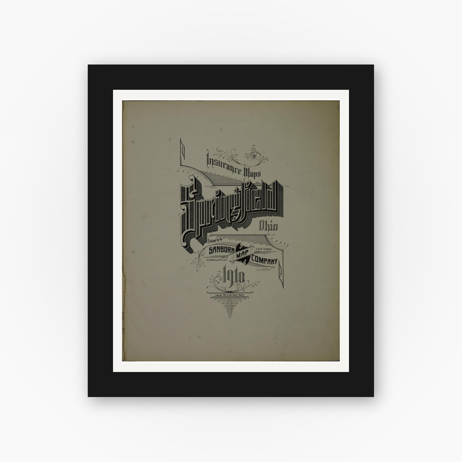 Old map wall art mockup — black gallery frame with white mat — Sanborn Fire Insurance Map from Springfield, Clark County, Ohio (1910), Sheet #0001