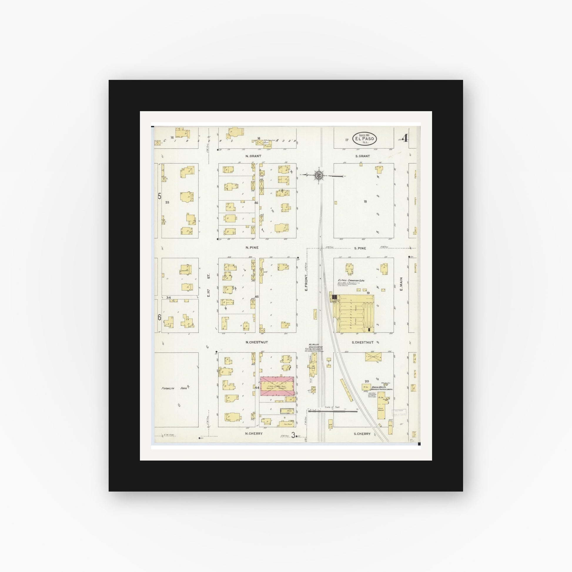 Old map wall art mockup — black gallery frame with white mat — Sanborn Fire Insurance Map from El Paso, Woodford County, Illinois (1911), Sheet #0004