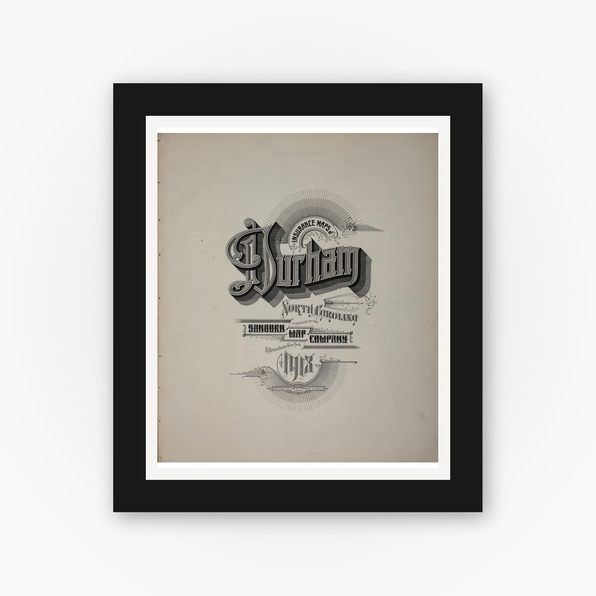 Old map wall art mockup — black gallery frame with white mat — Sanborn Fire Insurance Map from Durham, Durham County, North Carolina (1913), Sheet #0001