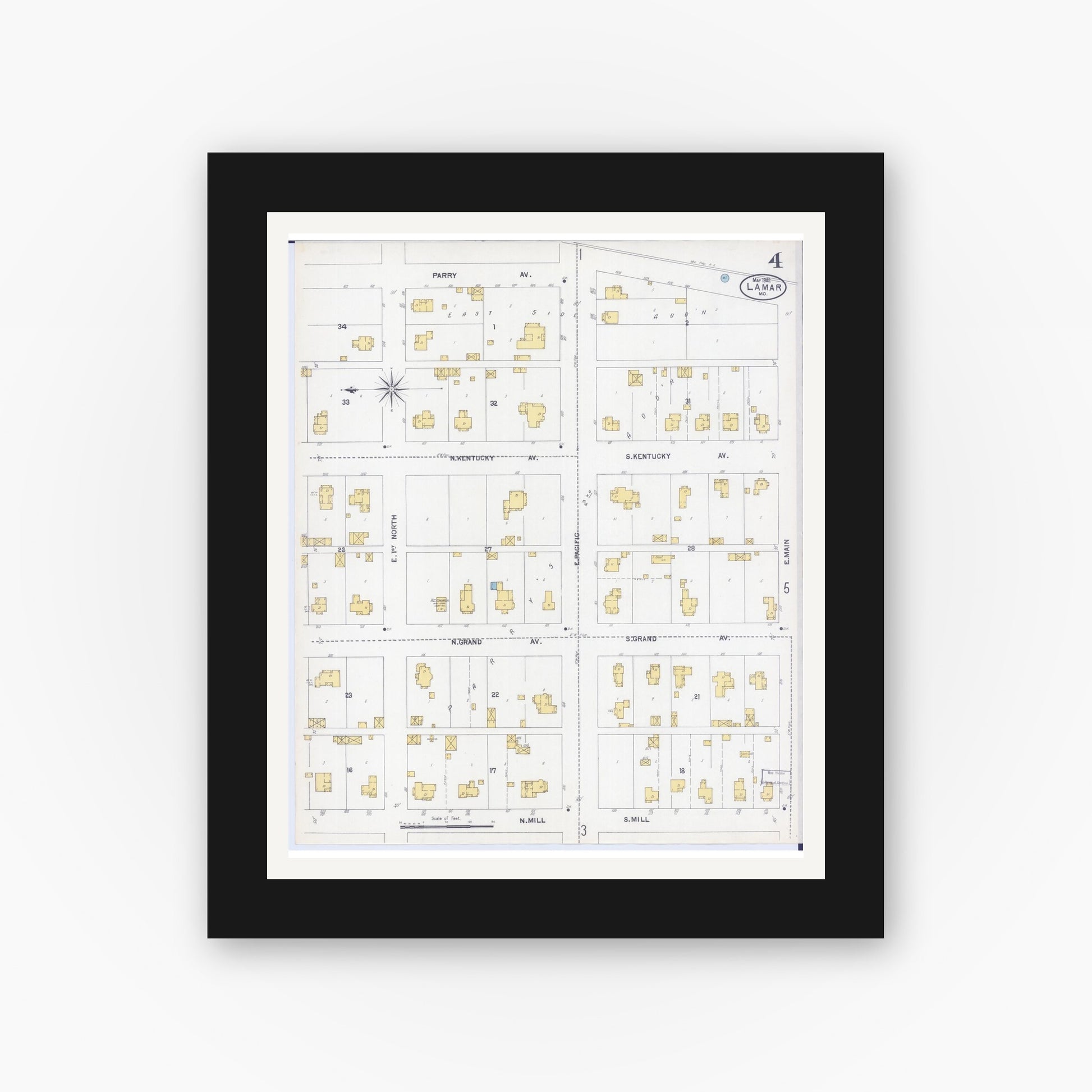 Old map wall art mockup — black gallery frame with white mat — Sanborn Fire Insurance Map from Lamar, Barton County, Missouri (1902), Sheet #0004