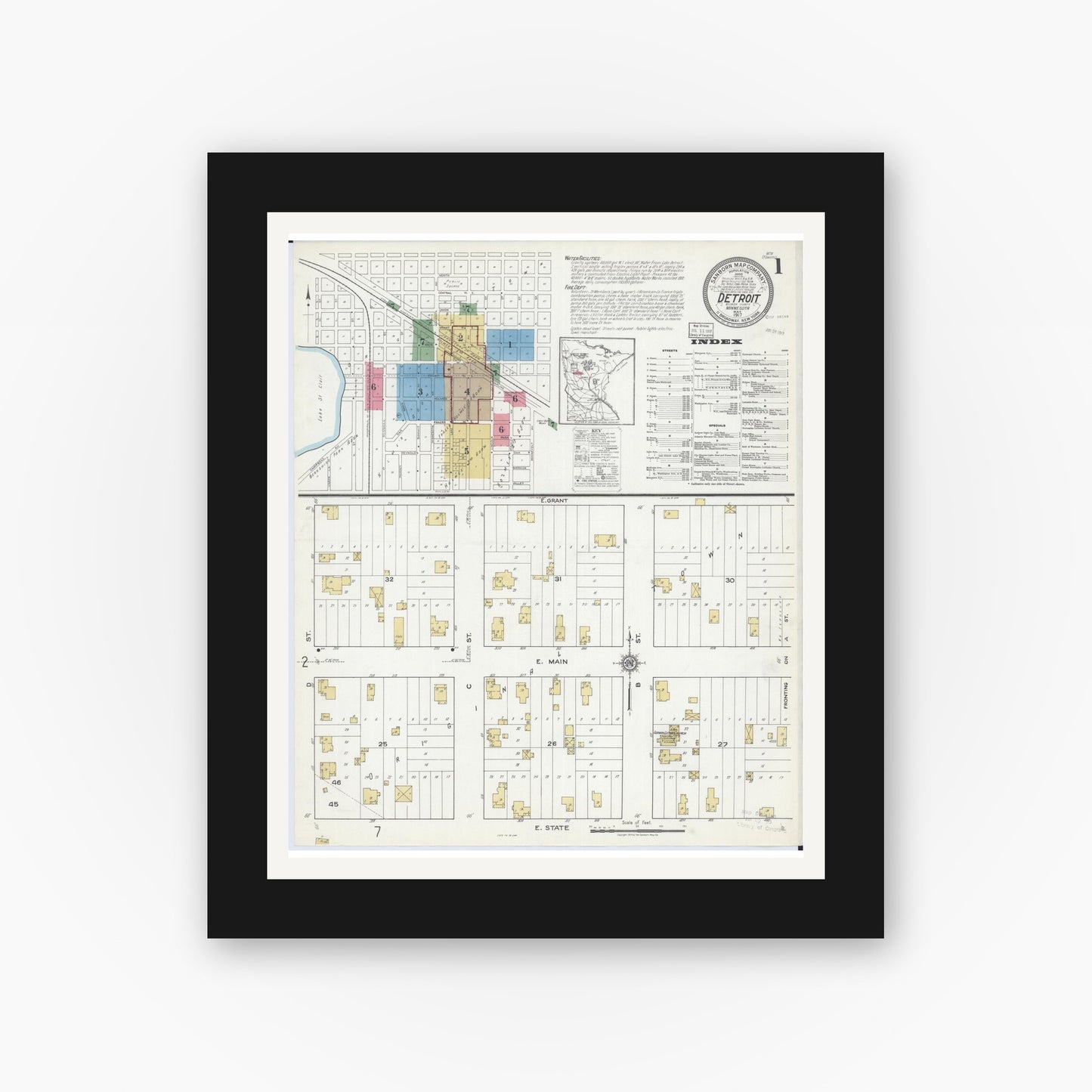 Old map wall art mockup — black gallery frame with white mat — Sanborn Fire Insurance Map from Detroit Lakes, Becker County, Minnesota (1917), Sheet #0001