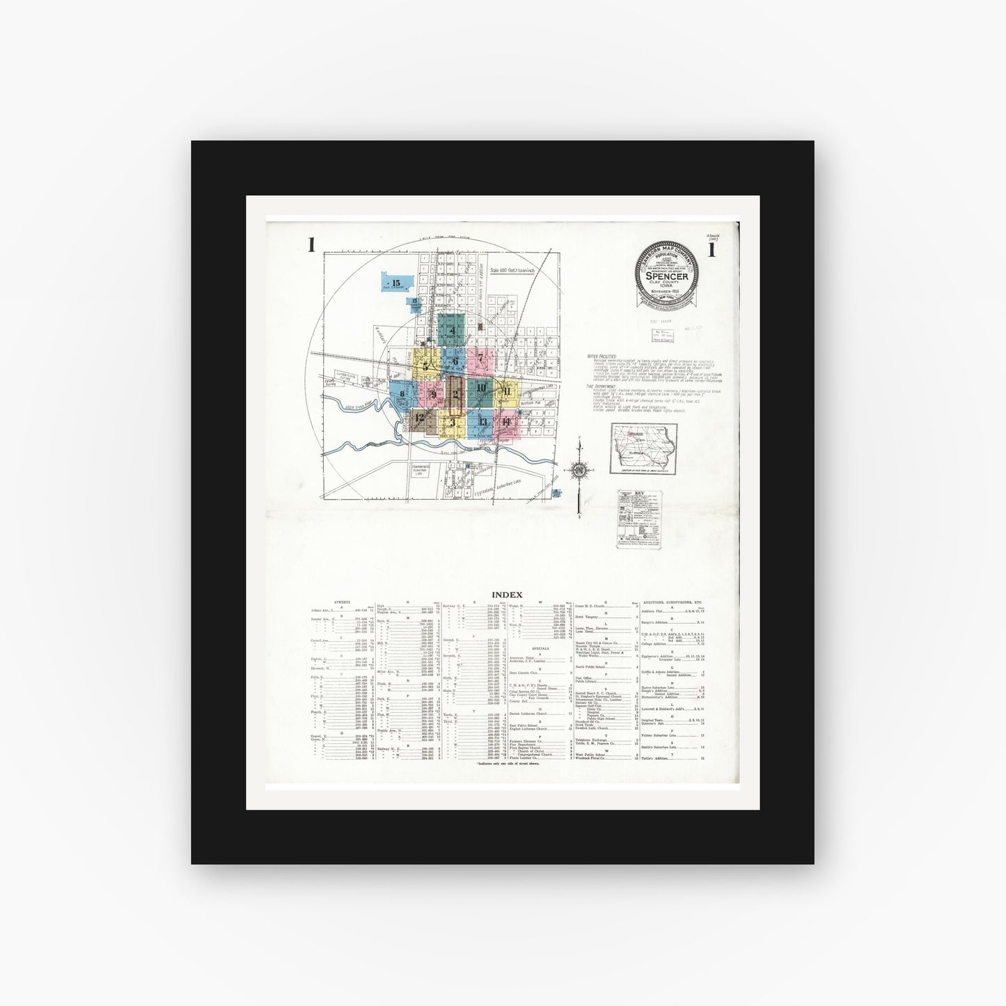 Old map wall art mockup — black gallery frame with white mat — Sanborn Fire Insurance Map from Spencer, Clay County, Iowa (1924) â€” Complete Set
