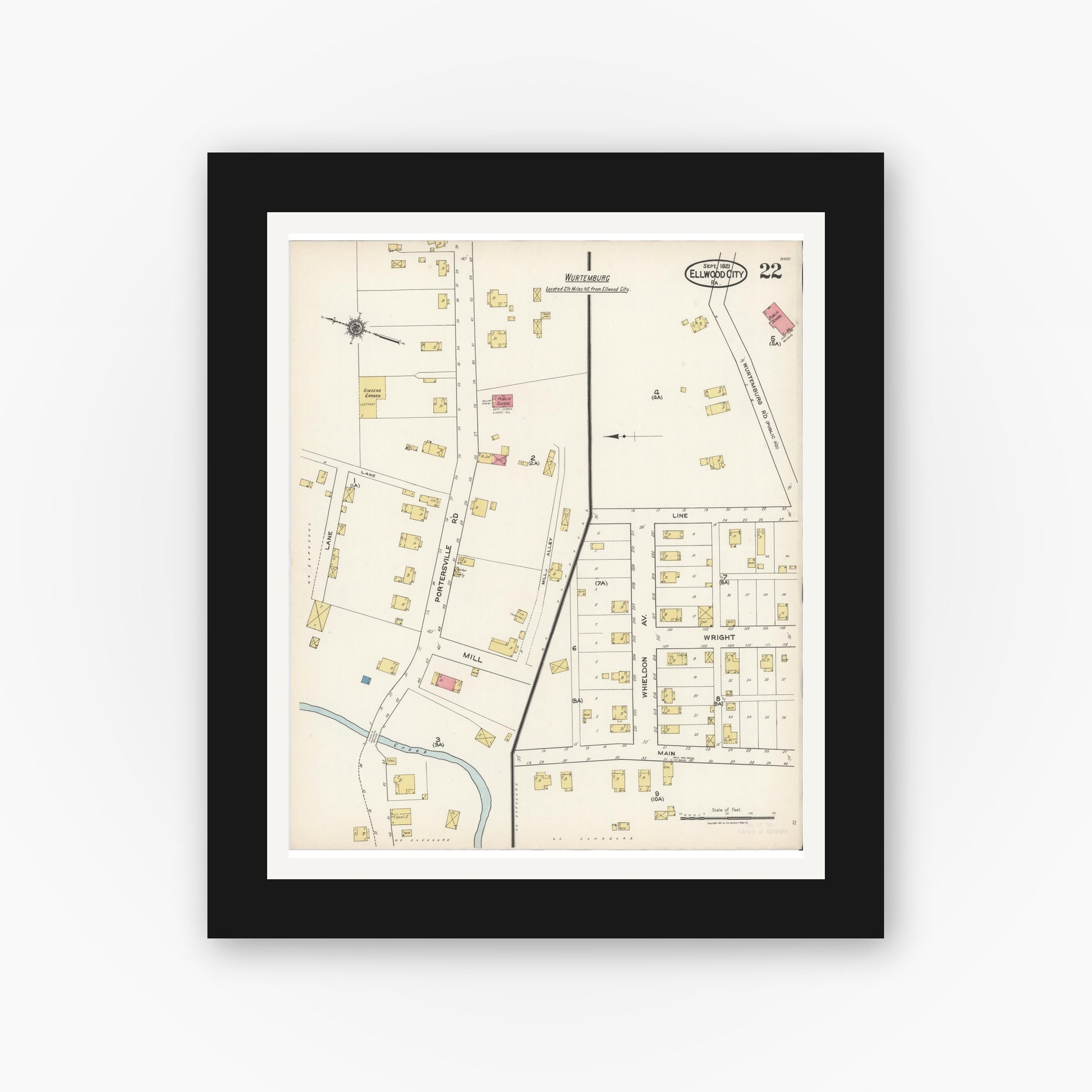 Old map wall art mockup — black gallery frame with white mat — Sanborn Fire Insurance Map from Ellwood City, Lawrence County, Pennsylvania (1921), Sheet #0022