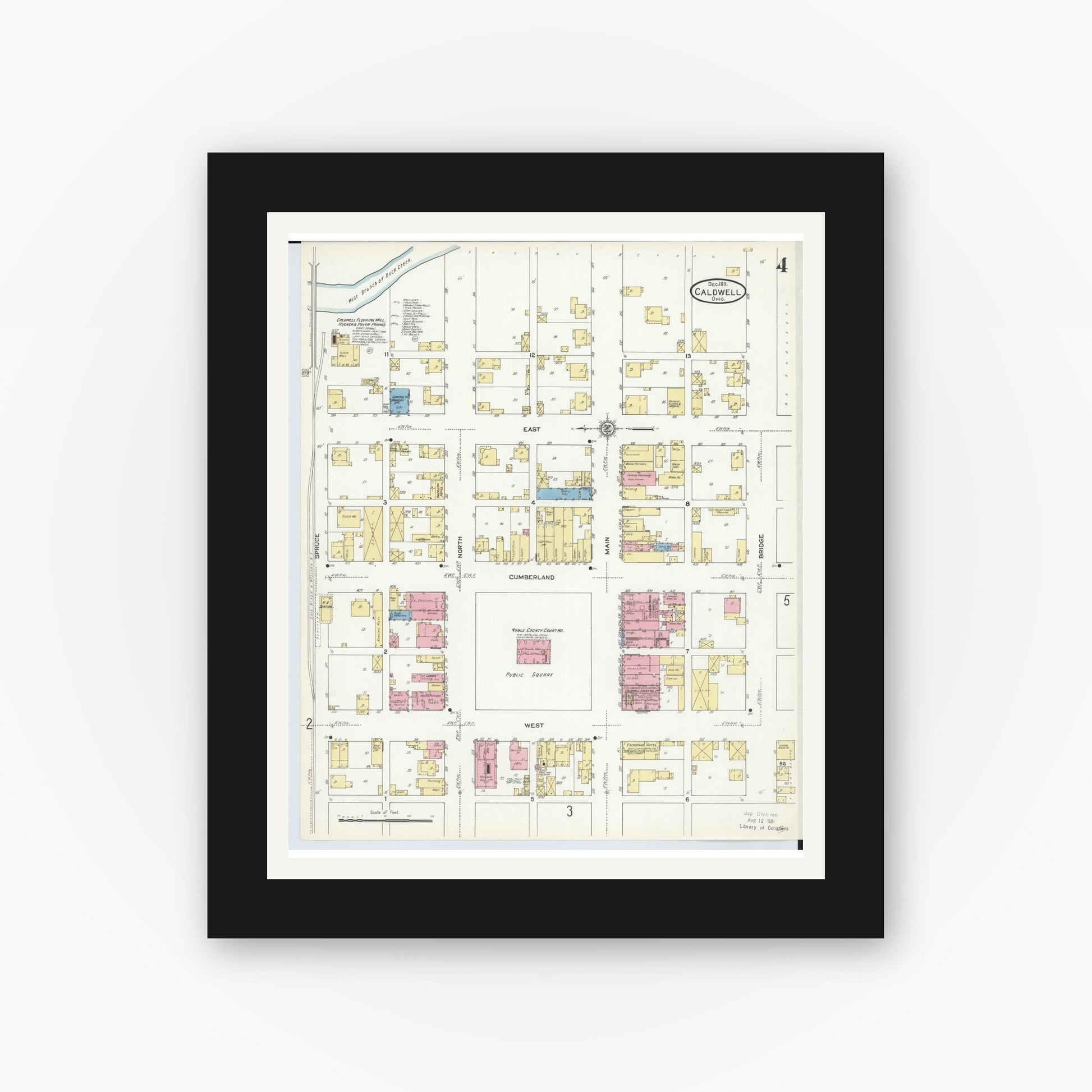 Old map wall art mockup — black gallery frame with white mat — Sanborn Fire Insurance Map from Caldwell, Noble County, Ohio (1911), Sheet #0004