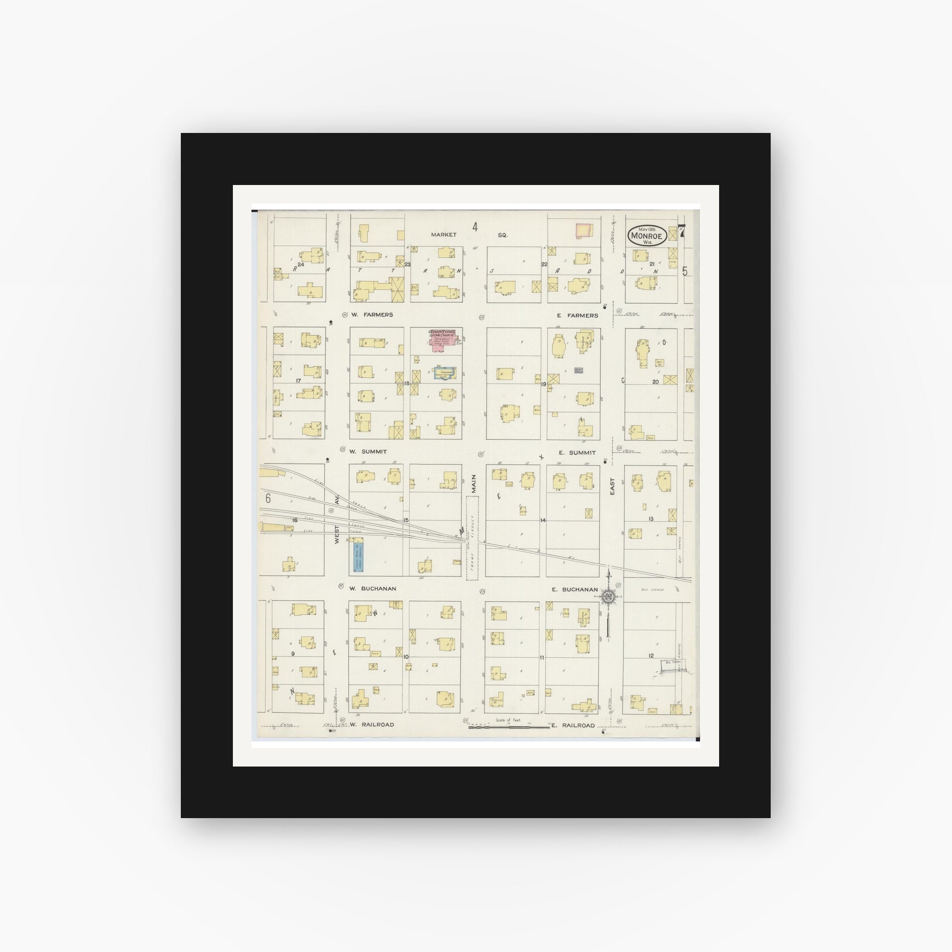 Old map wall art mockup — black gallery frame with white mat — Sanborn Fire Insurance Map from Monroe, Green County, Wisconsin (1915), Sheet #0007
