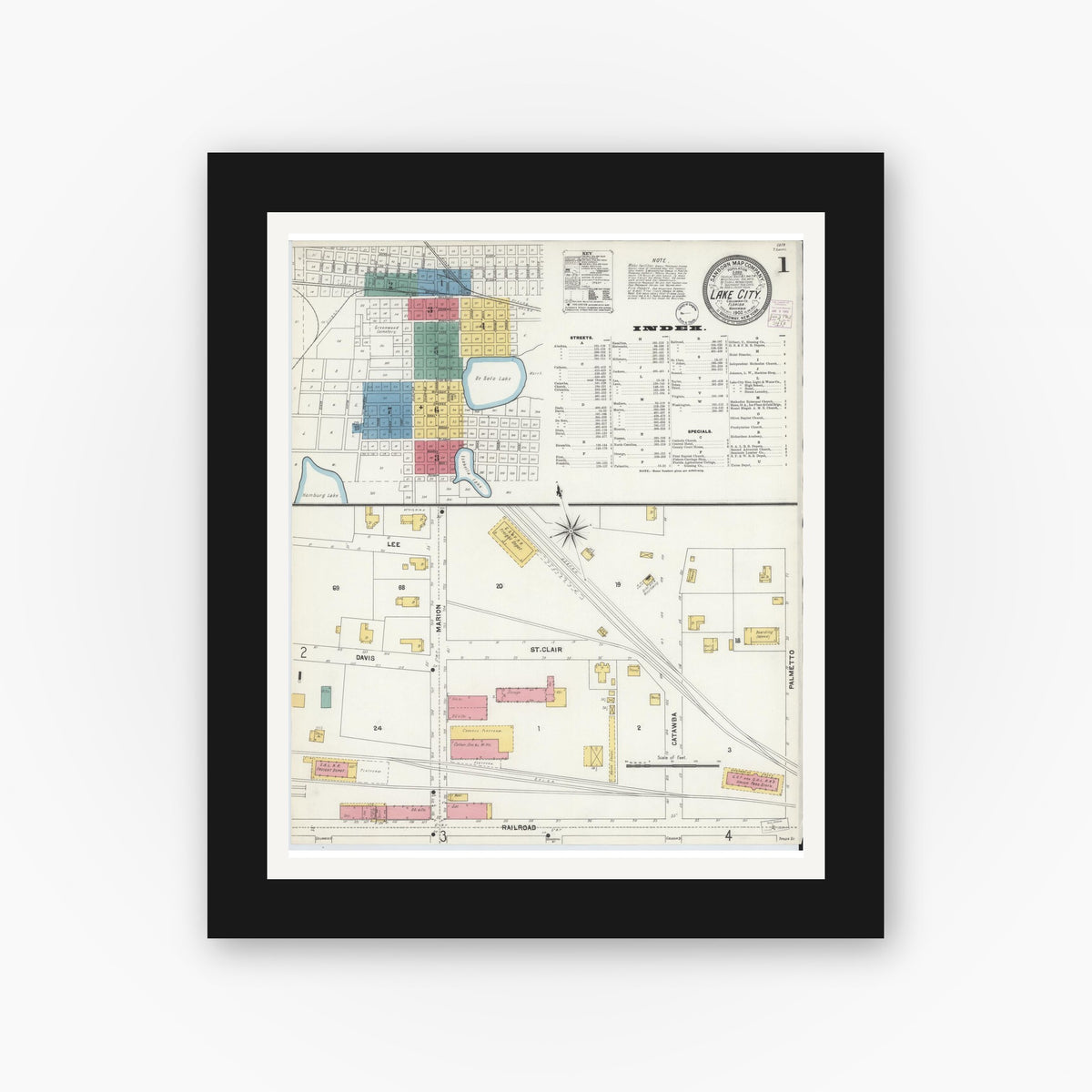 Old map wall art mockup — black gallery frame with white mat — Sanborn Fire Insurance Map from Lake City, Columbia County, Florida (1902), Sheet #0001