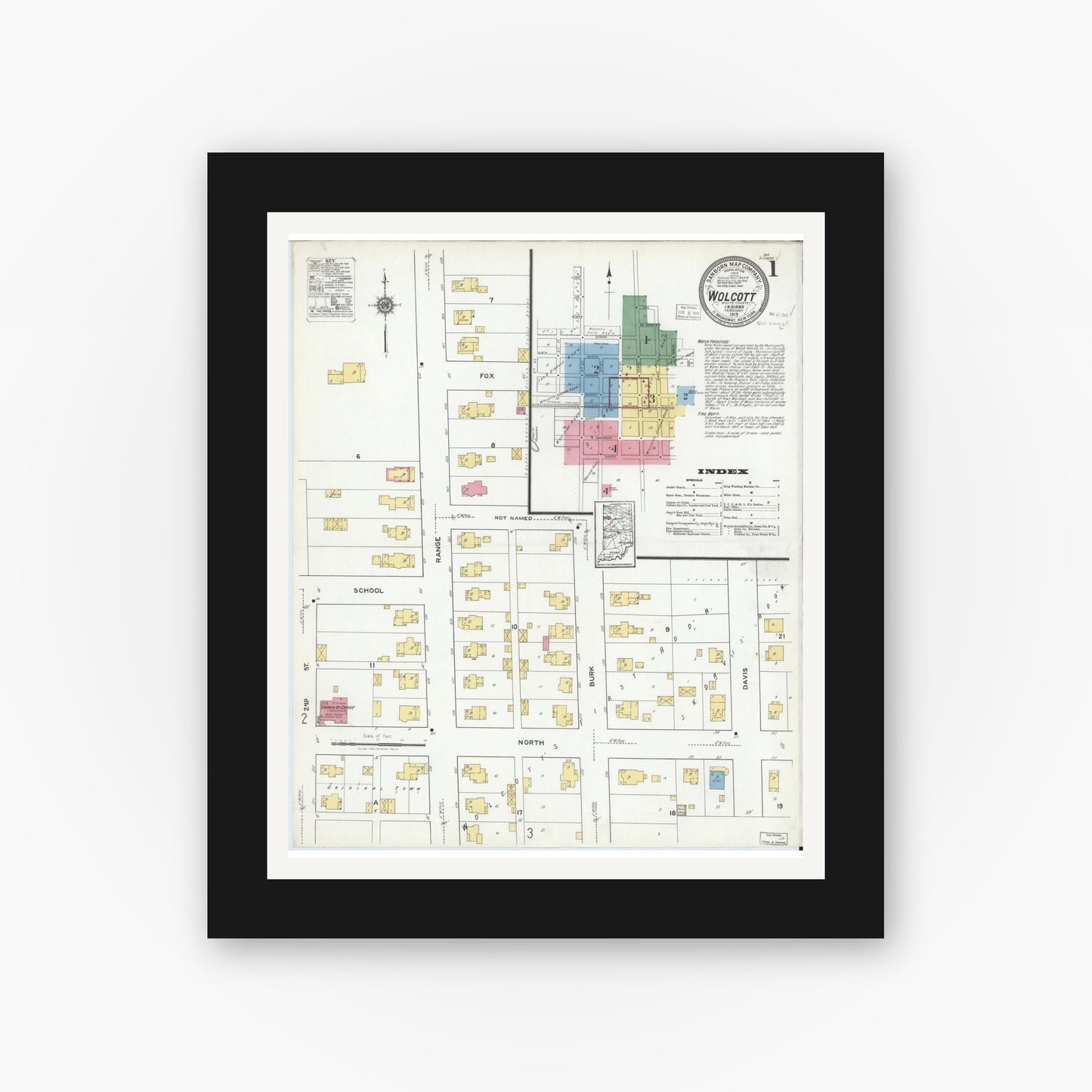 Old map wall art mockup — black gallery frame with white mat — Sanborn Fire Insurance Map from Wolcott, White County, Indiana (1919) - Complete Map Set