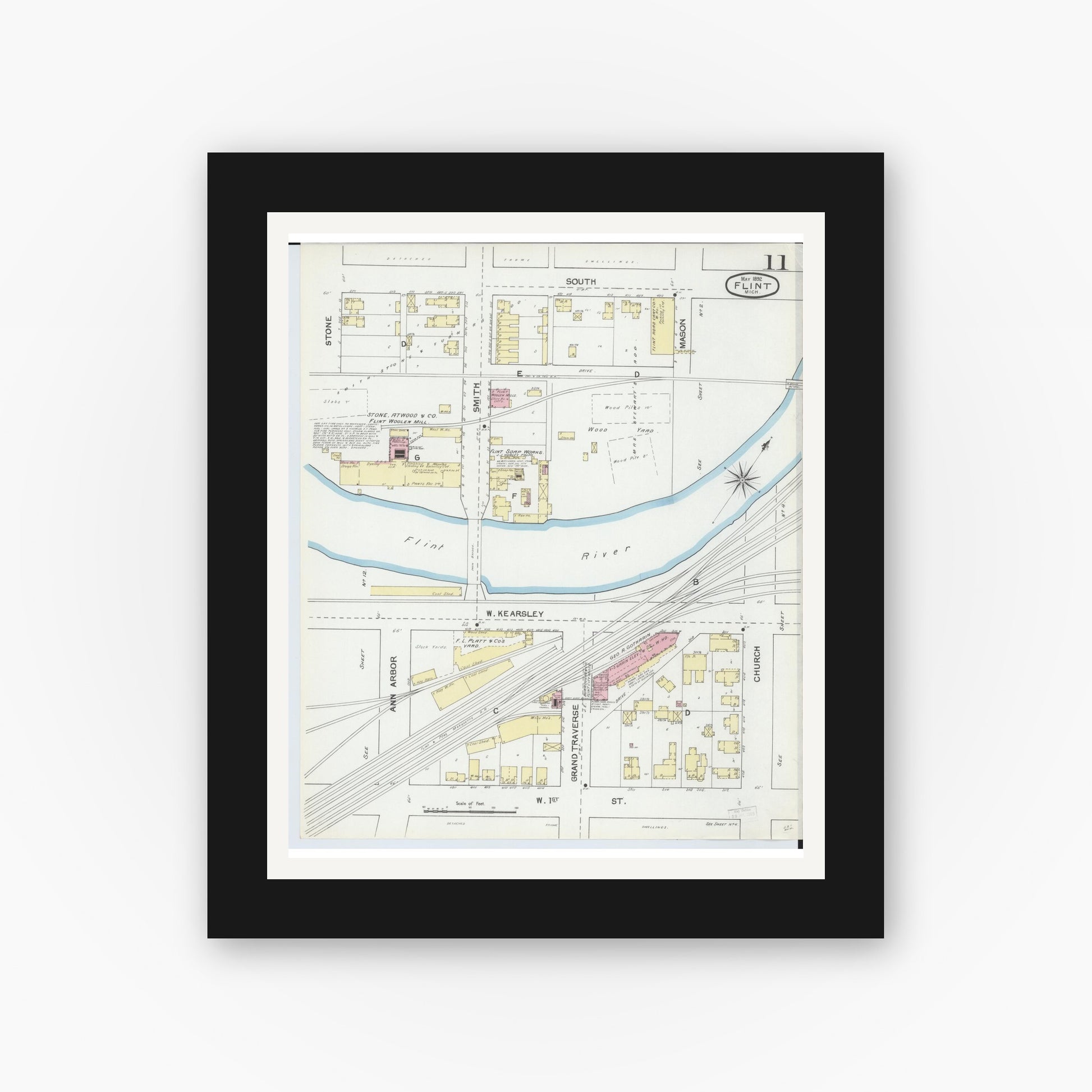 Old map wall art mockup — black gallery frame with white mat — Sanborn Fire Insurance Map from Flint, Genesee County, Michigan (1892), Sheet #0011