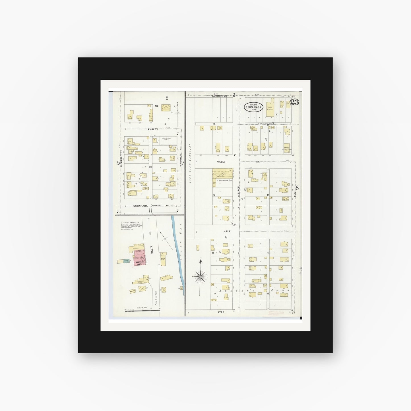 Old map wall art mockup — black gallery frame with white mat — Sanborn Fire Insurance Map from Escanaba, Delta County, Michigan (1906), Sheet #0023