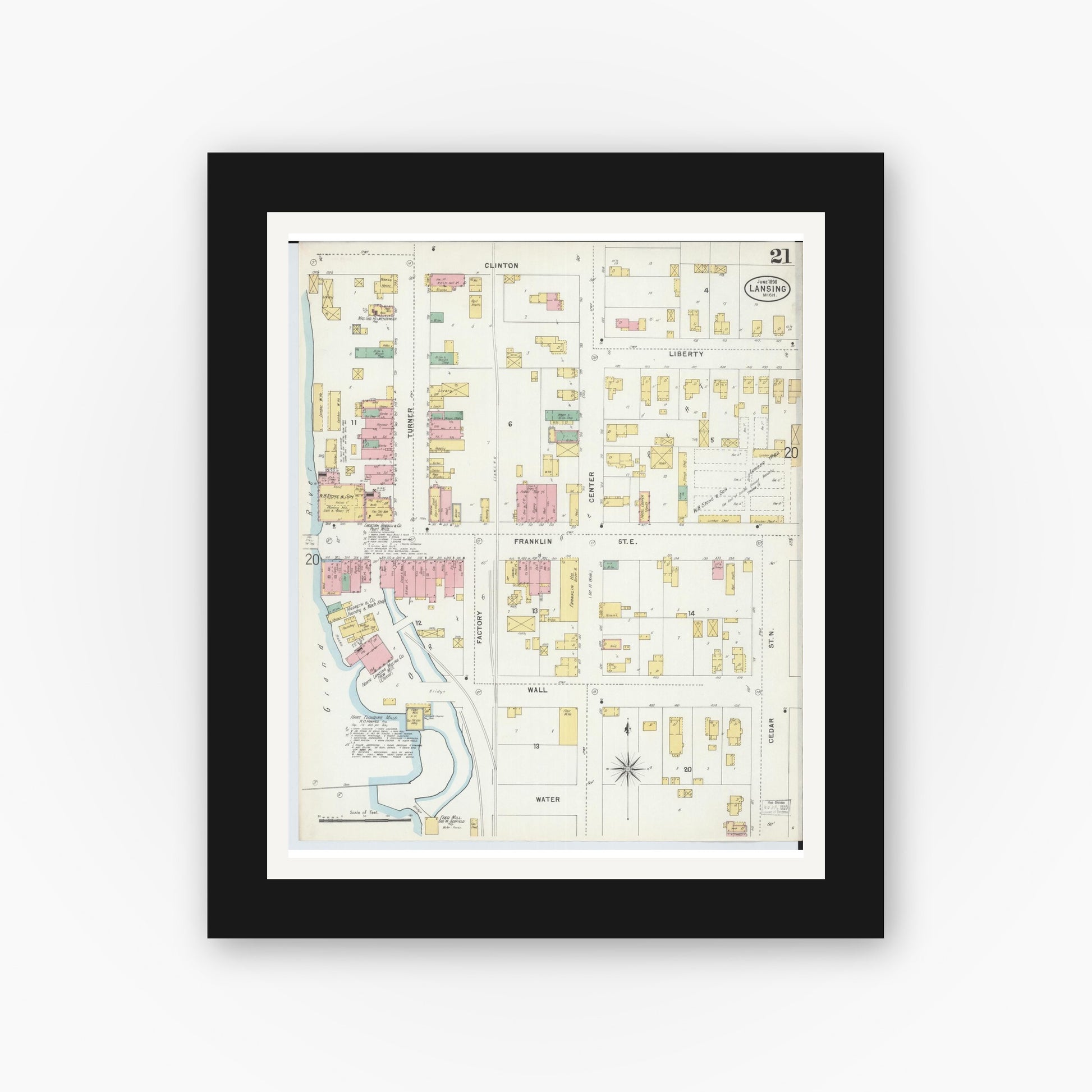 Old map wall art mockup — black gallery frame with white mat — Sanborn Fire Insurance Map from Lansing, Ingham County, Michigan (1898), Sheet #0021