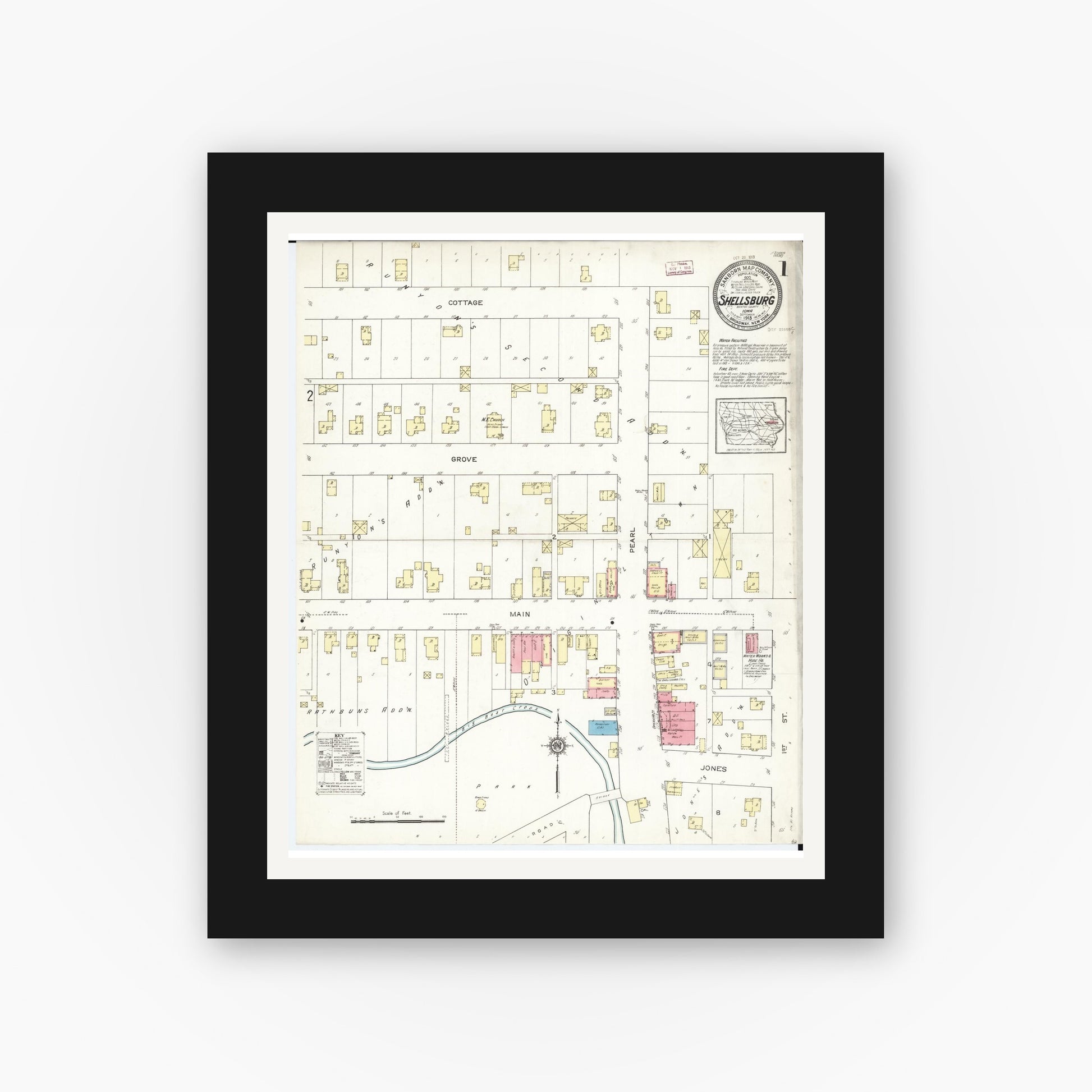 Old map wall art mockup — black gallery frame with white mat — Sanborn Fire Insurance Map from Shellsburg, Benton County, Iowa (1913) â€” Complete Set