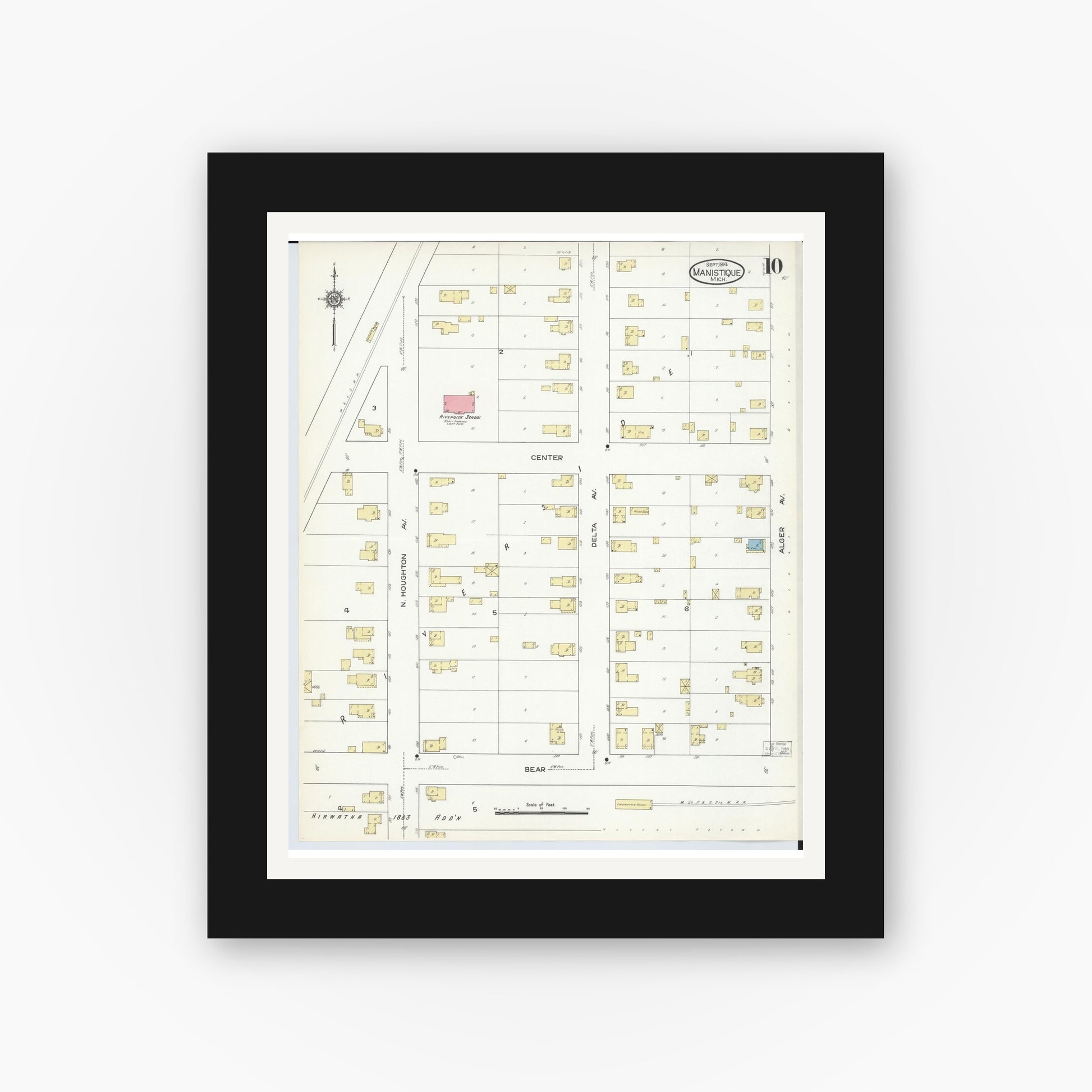 Old map wall art mockup — black gallery frame with white mat — Sanborn Fire Insurance Map from Manistique, Schoolcraft County, Michigan (1914), Sheet #0010