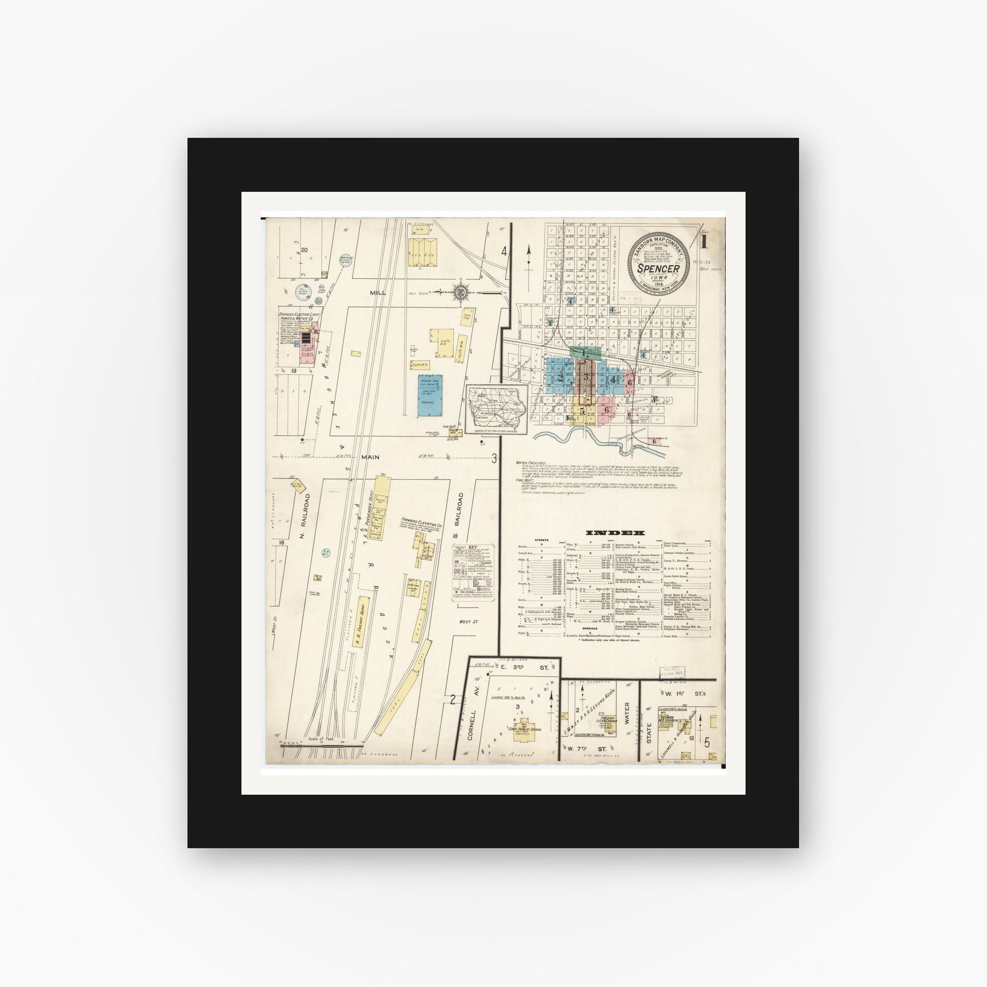 Old map wall art mockup — black gallery frame with white mat — Sanborn Fire Insurance Map from Spencer, Clay County, Iowa (1915), Sheet #0001