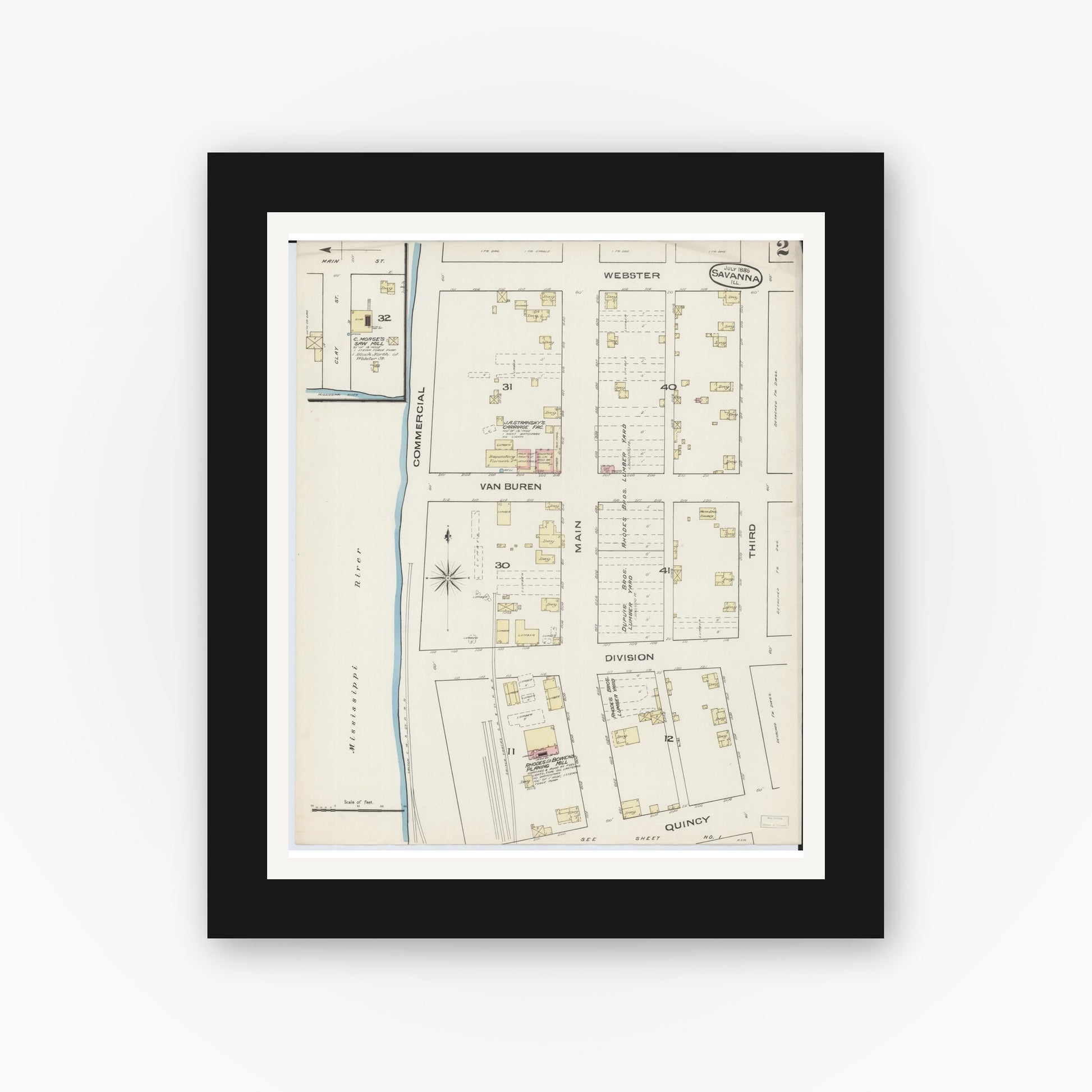 Old map wall art mockup — black gallery frame with white mat — Sanborn Fire Insurance Map from Savanna, Carroll County, Illinois (1885), Sheet #0002
